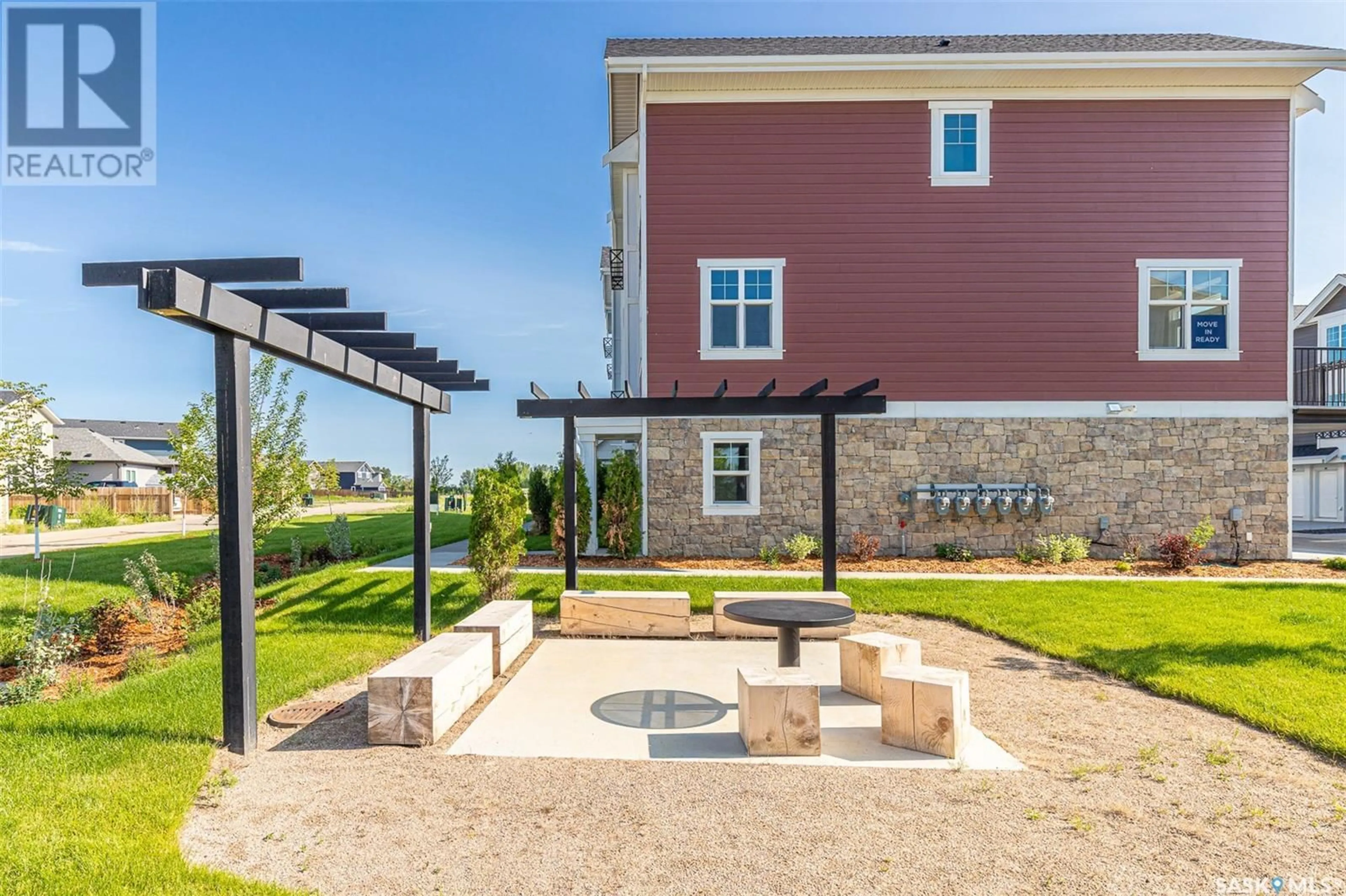 Patio, the fenced backyard for 608 701 Meadows BOULEVARD, Saskatoon Saskatchewan S7V0H5