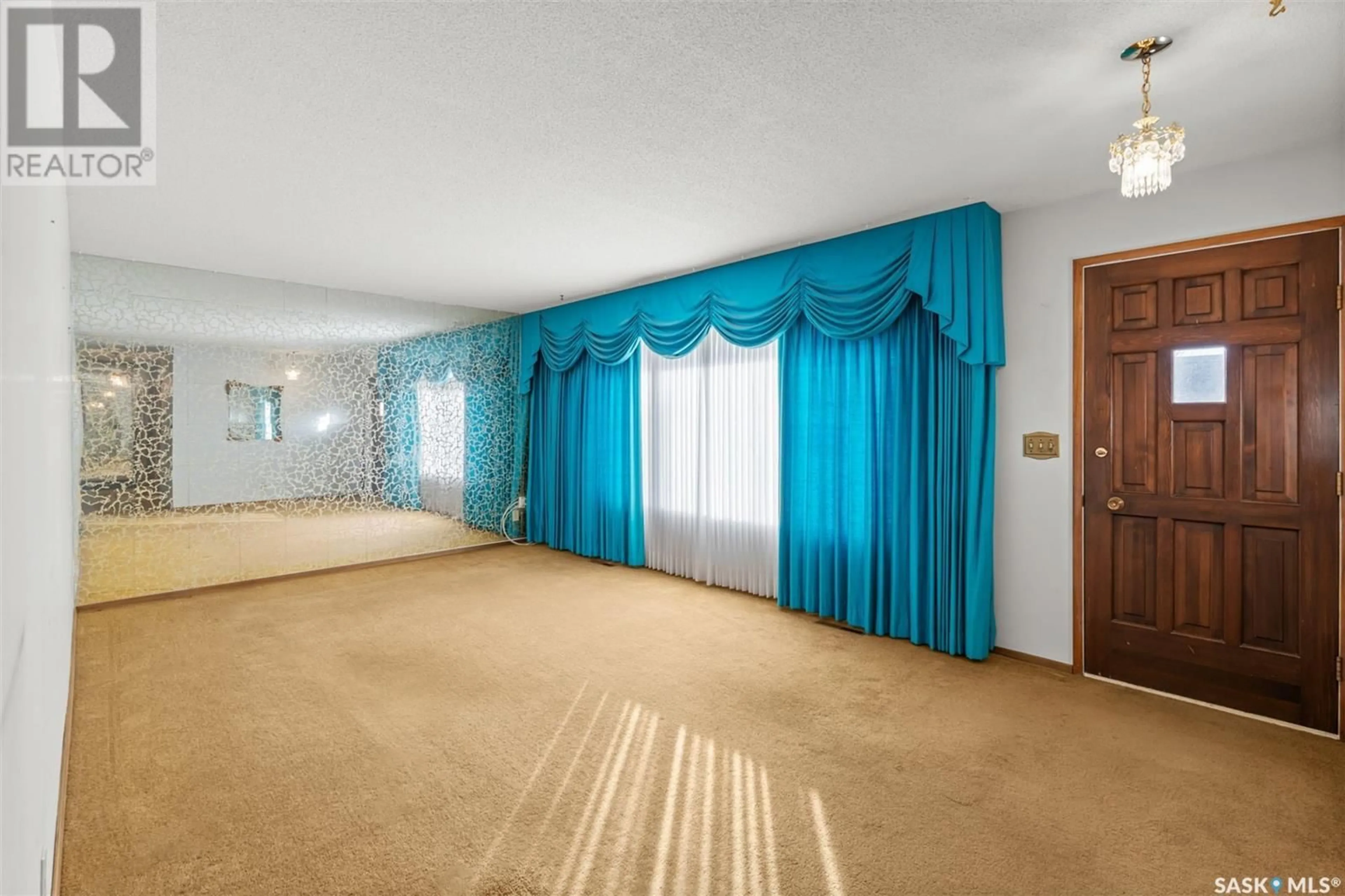 Media room, carpet floors for 830 L AVENUE S, Saskatoon Saskatchewan S7M2J1