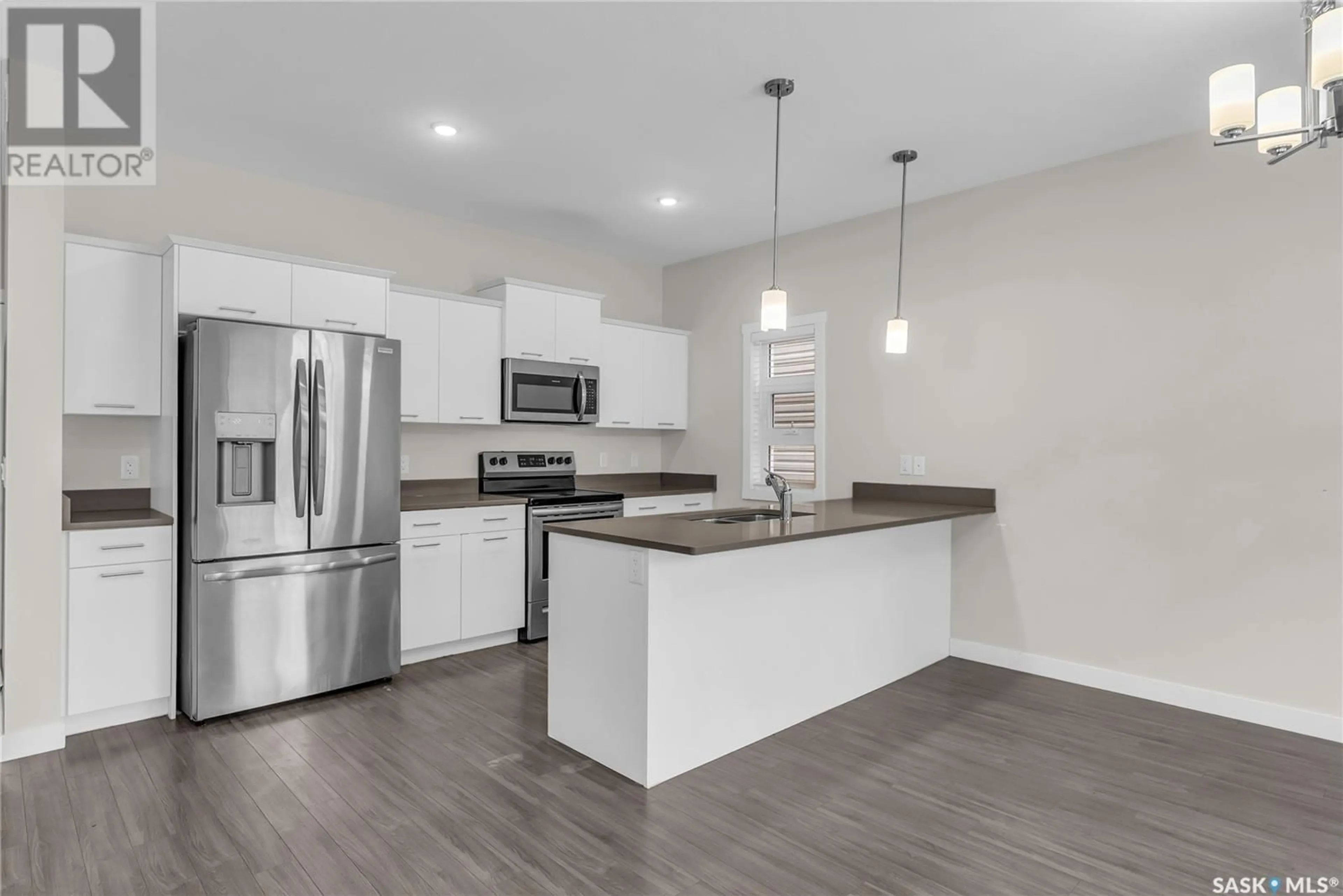 Open concept kitchen for 122 315 Dickson CRESCENT, Saskatoon Saskatchewan S7T0Z1