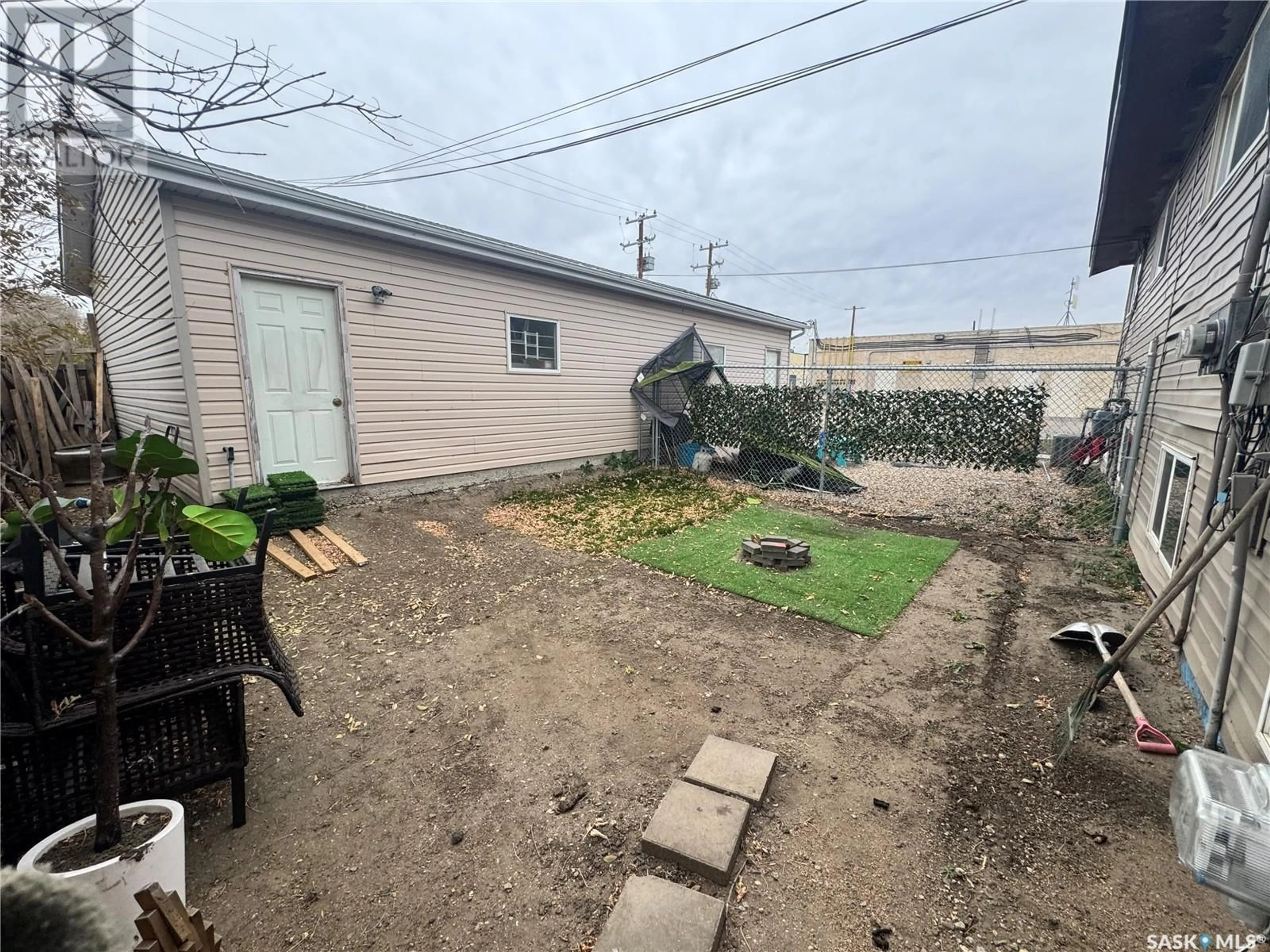 Patio, the fenced backyard for 119 X AVENUE S, Saskatoon Saskatchewan S7M3H2