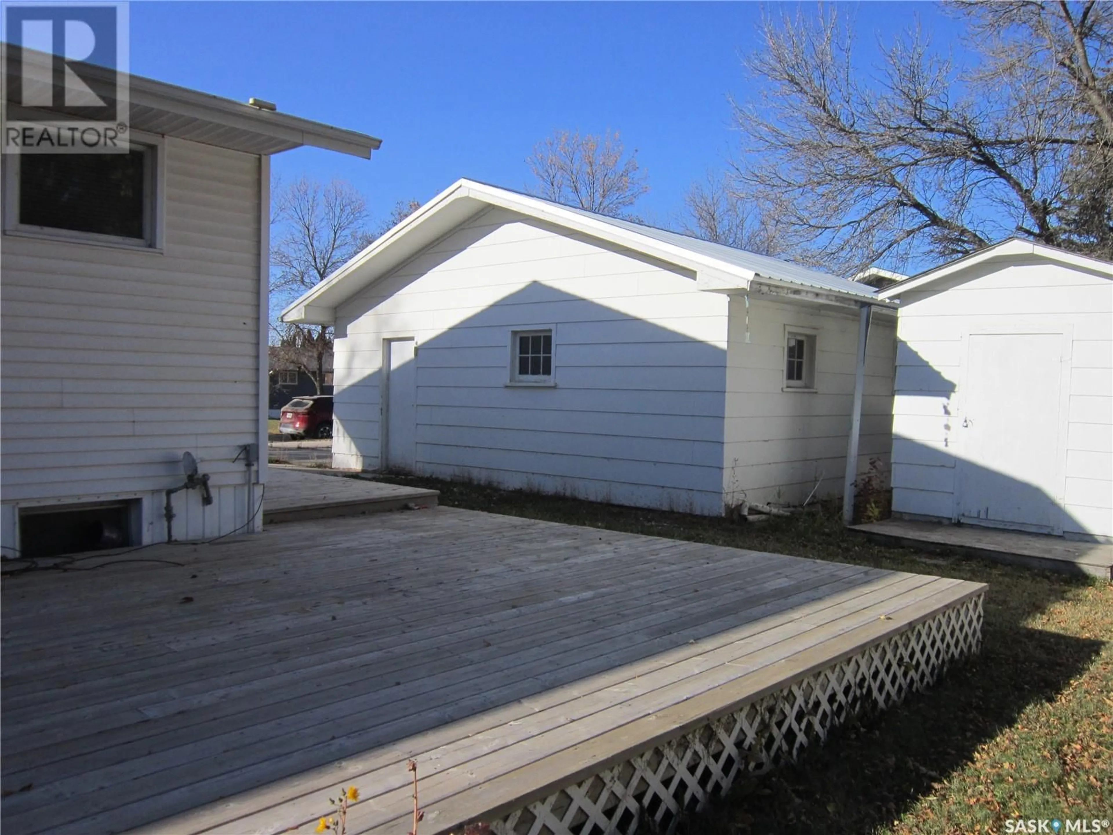 Frontside or backside of a home, the front or back of building for 1996 Newmarket DRIVE, Tisdale Saskatchewan S0E1T0