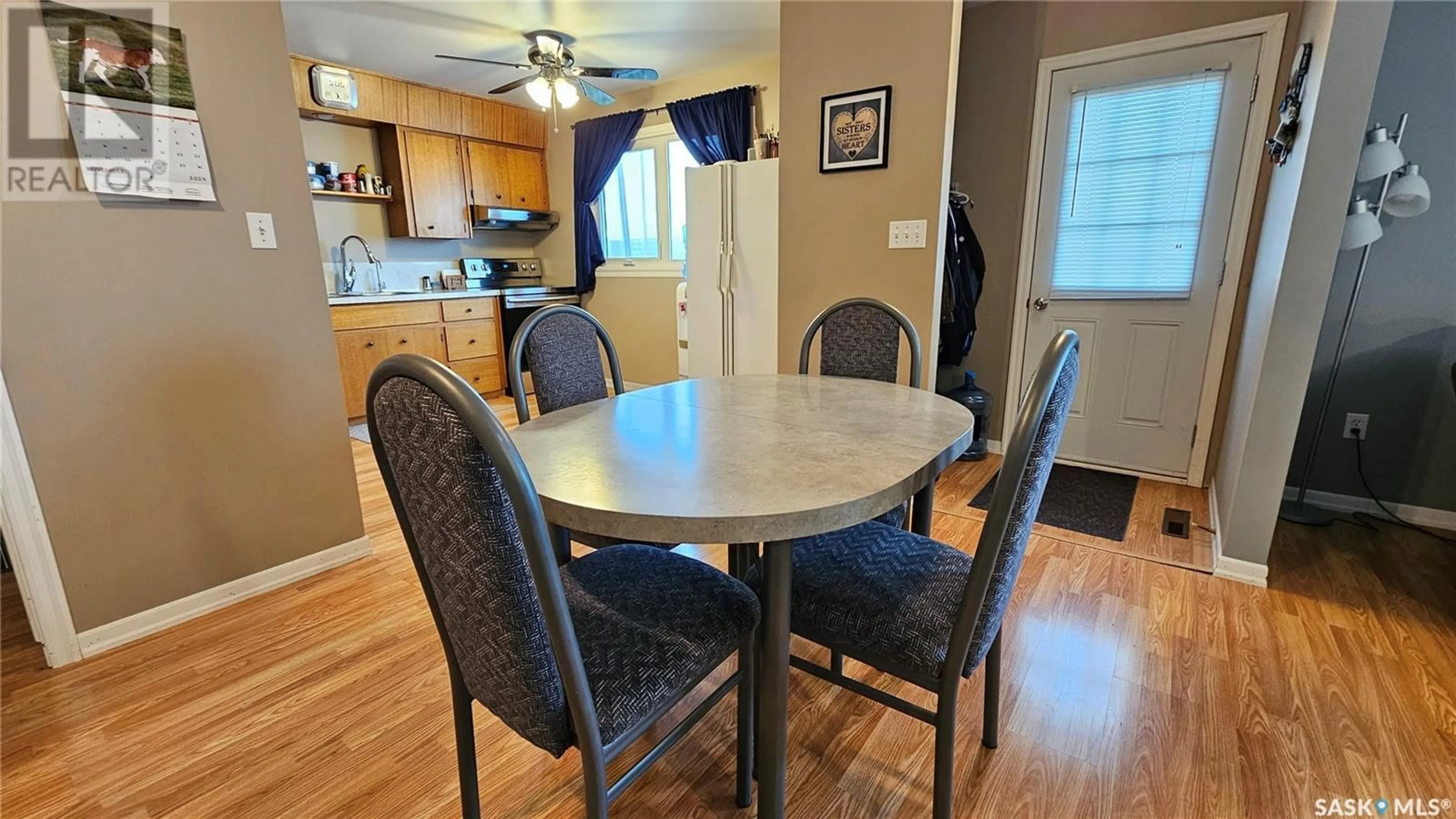 Dining room, wood floors, cottage for 108 Railway AVENUE E, Waldeck Saskatchewan S0H4J0