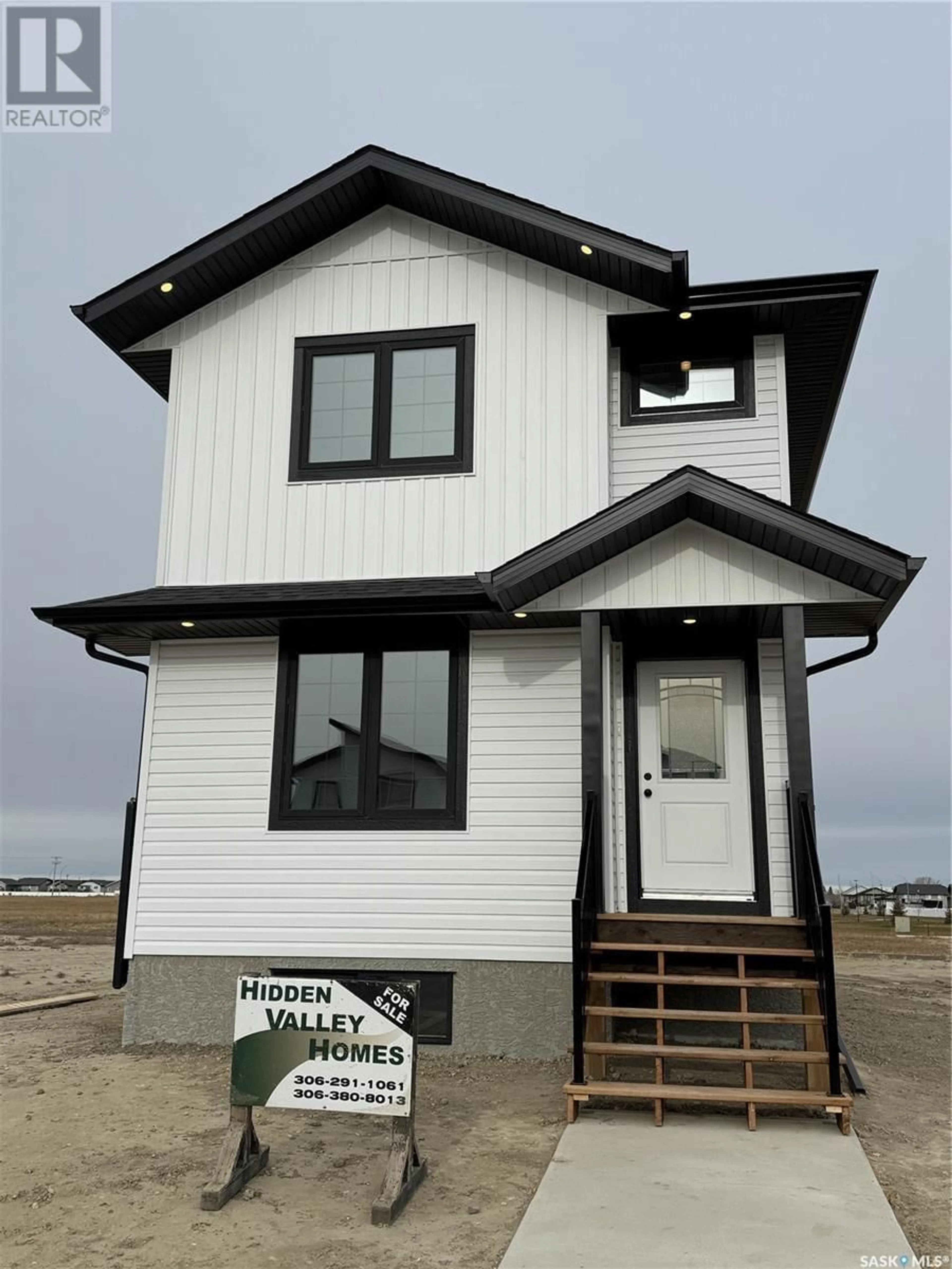 Frontside or backside of a home, cottage for 402 Eldorado STREET, Warman Saskatchewan S0K4S0