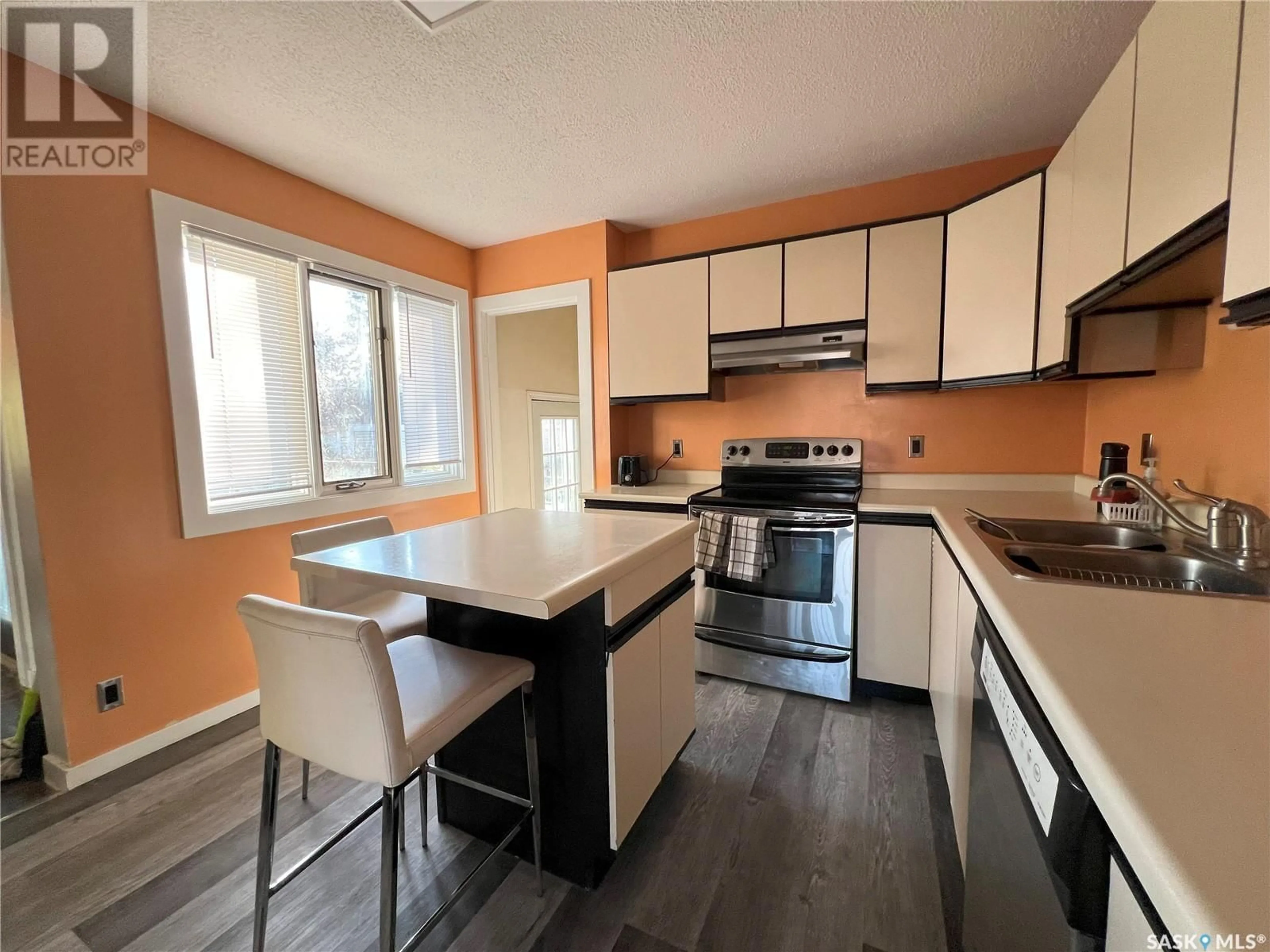 Open concept kitchen for 49 21st STREET E, Prince Albert Saskatchewan S6V1L7