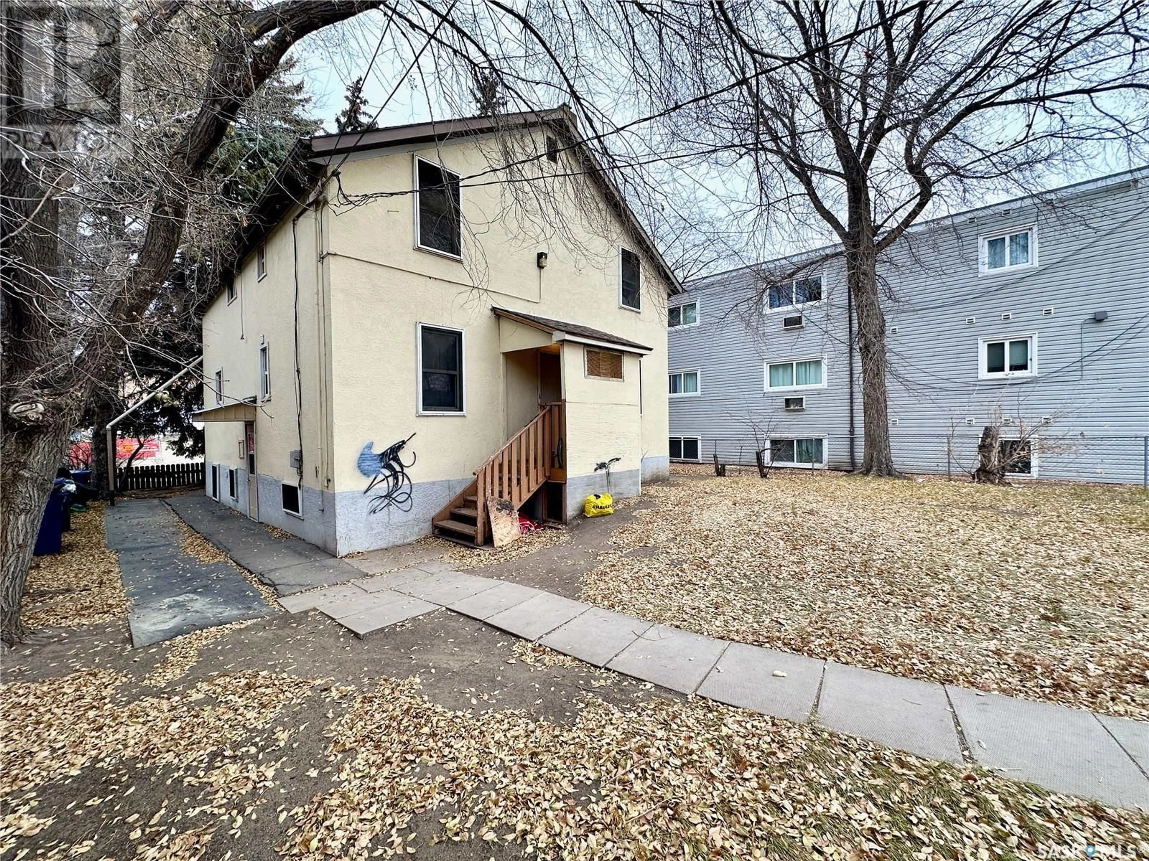 A pic from exterior of the house or condo, the street view for 1705 20th STREET W, Saskatoon Saskatchewan S7M0Z8