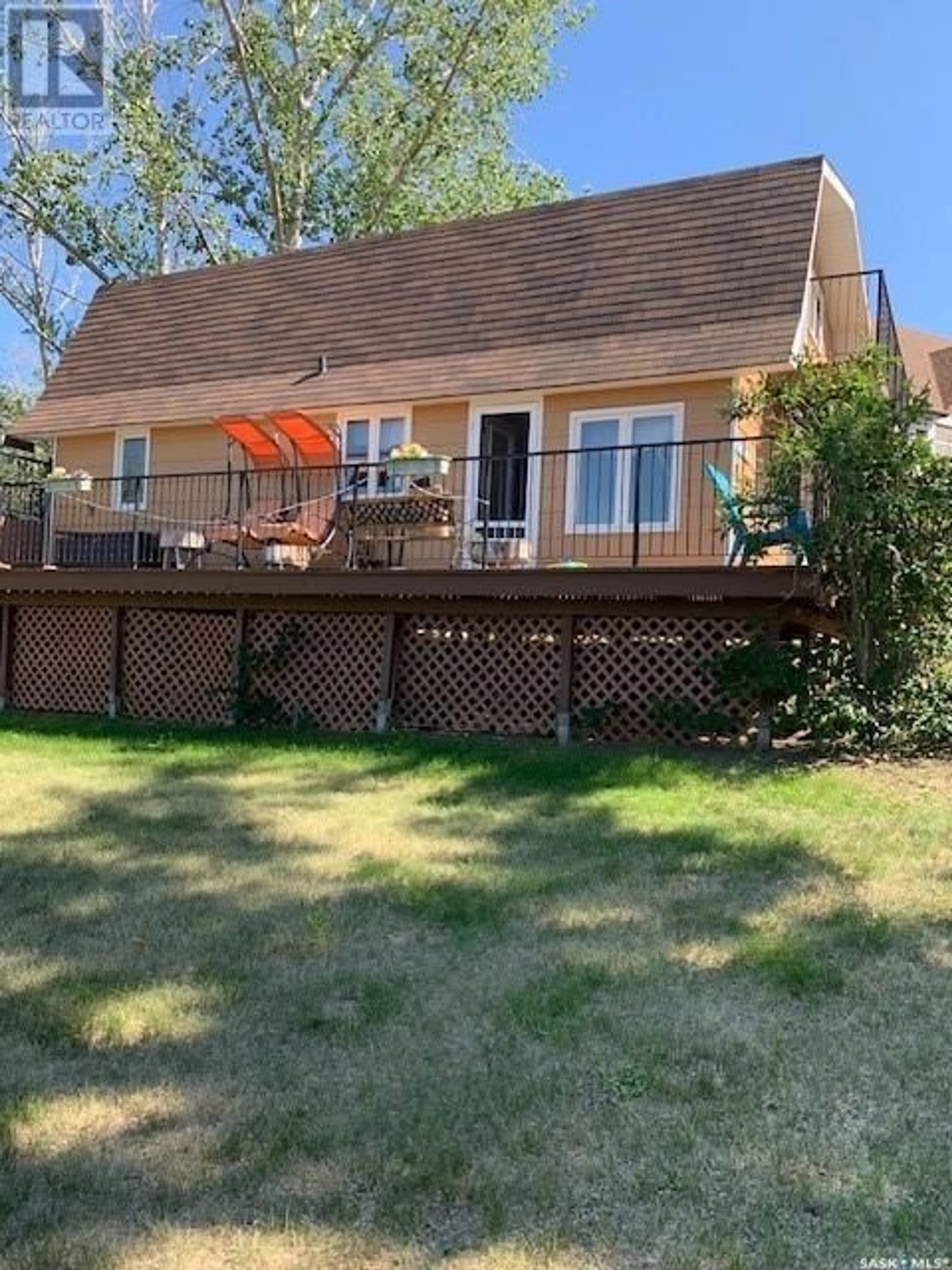 Frontside or backside of a home, the fenced backyard for 45 Snedden CRESCENT, Palliser Regional Park Saskatchewan S0H3P0