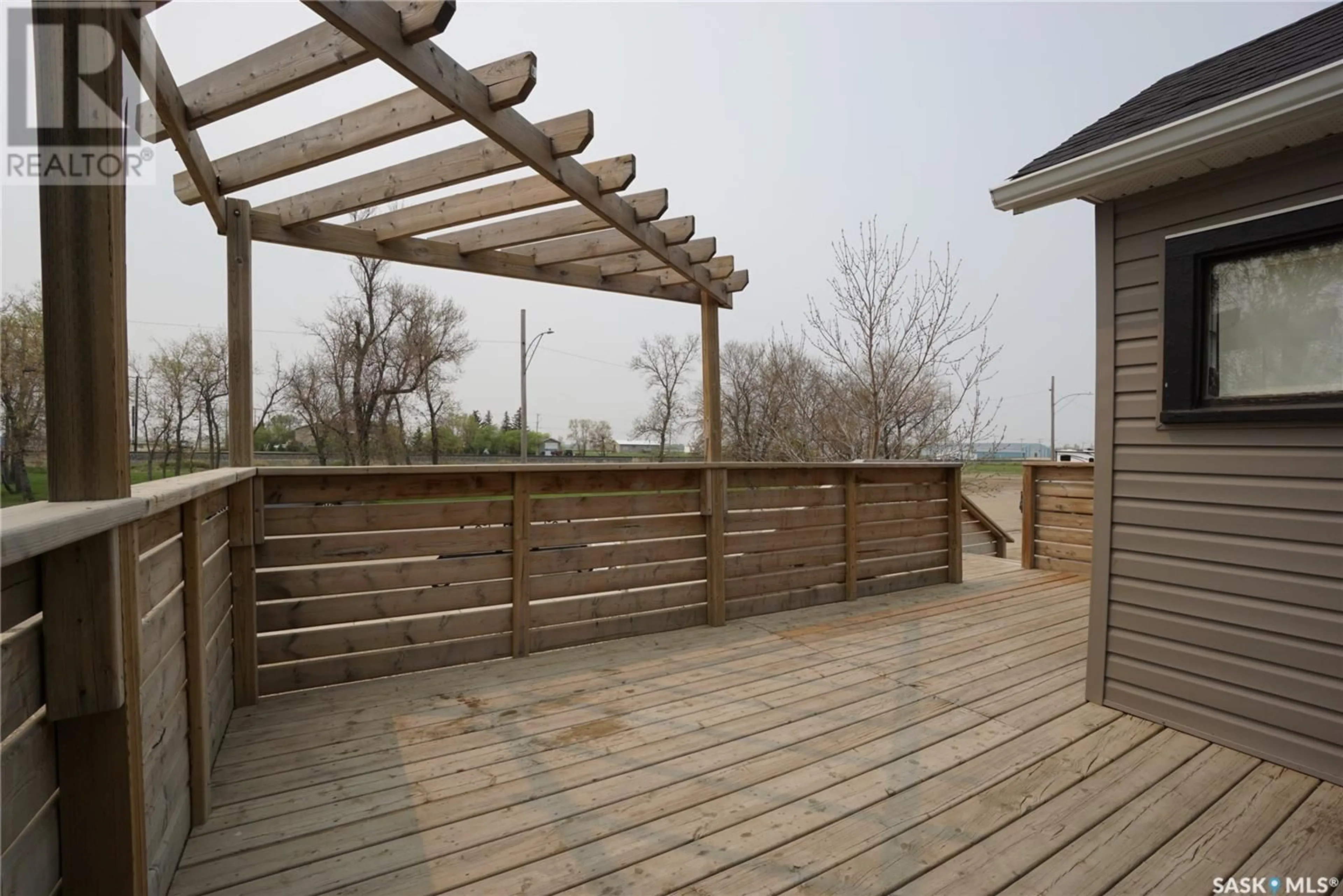 Patio, the fenced backyard for 710 Railway AVENUE, Milestone Saskatchewan S0G3L0