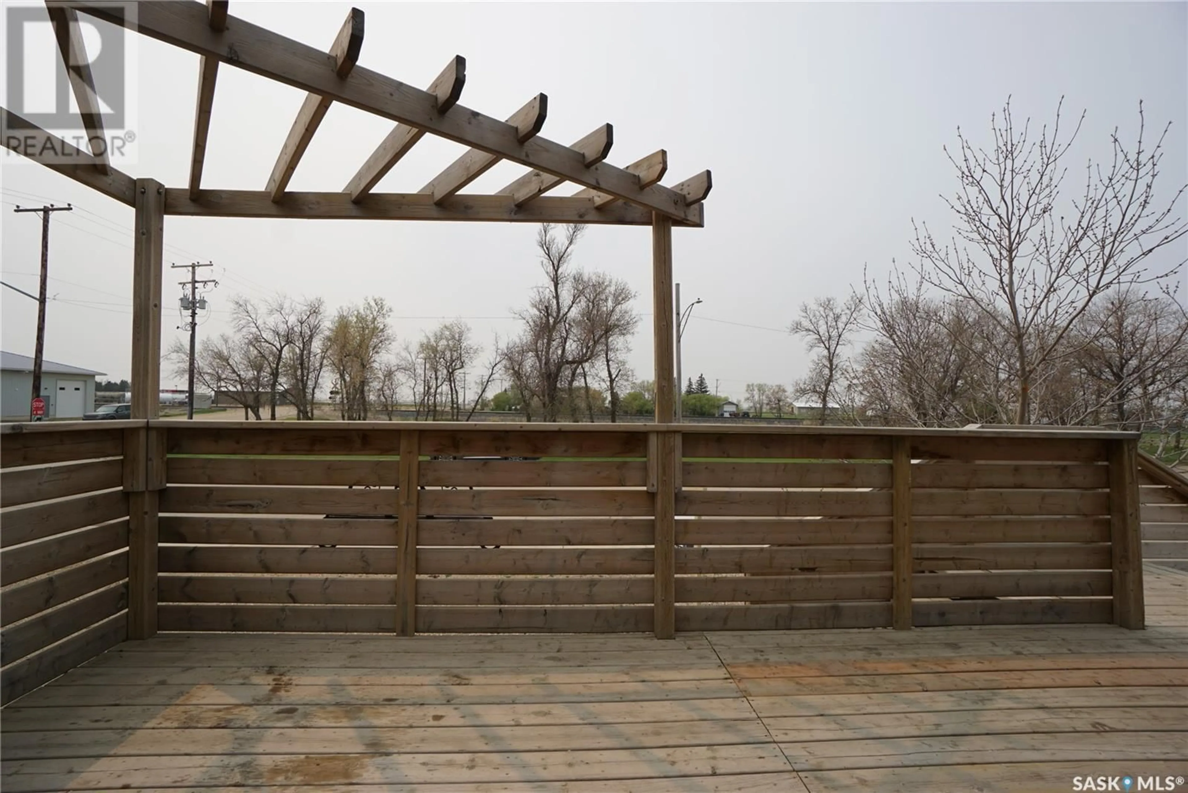 Patio, the fenced backyard for 710 Railway AVENUE, Milestone Saskatchewan S0G3L0