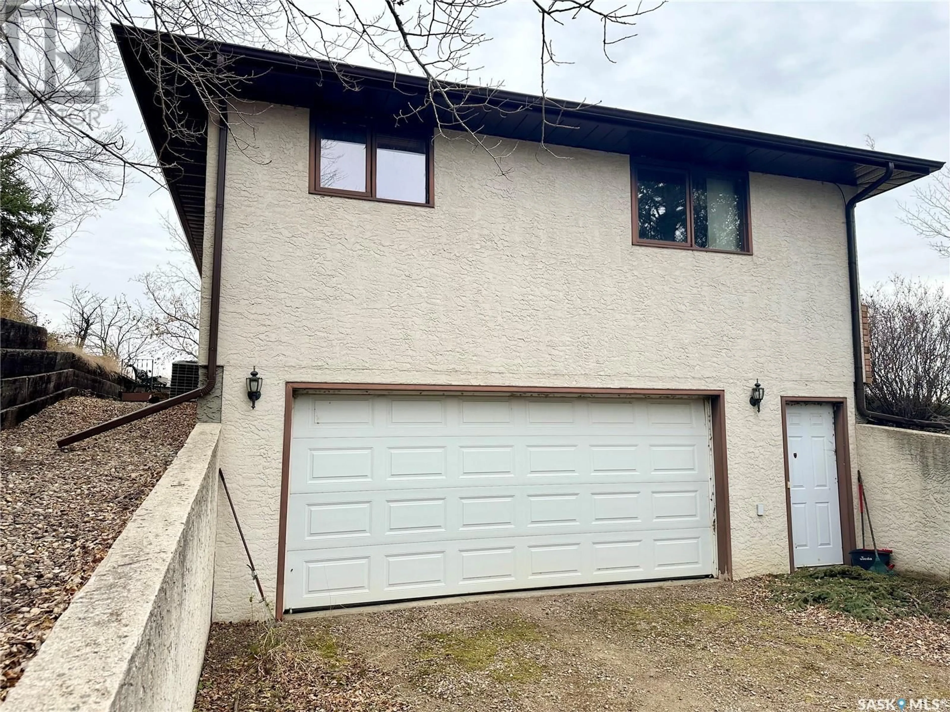 Frontside or backside of a home, cottage for 22 Poundmaker TRAIL, North Battleford Saskatchewan S9A2X6