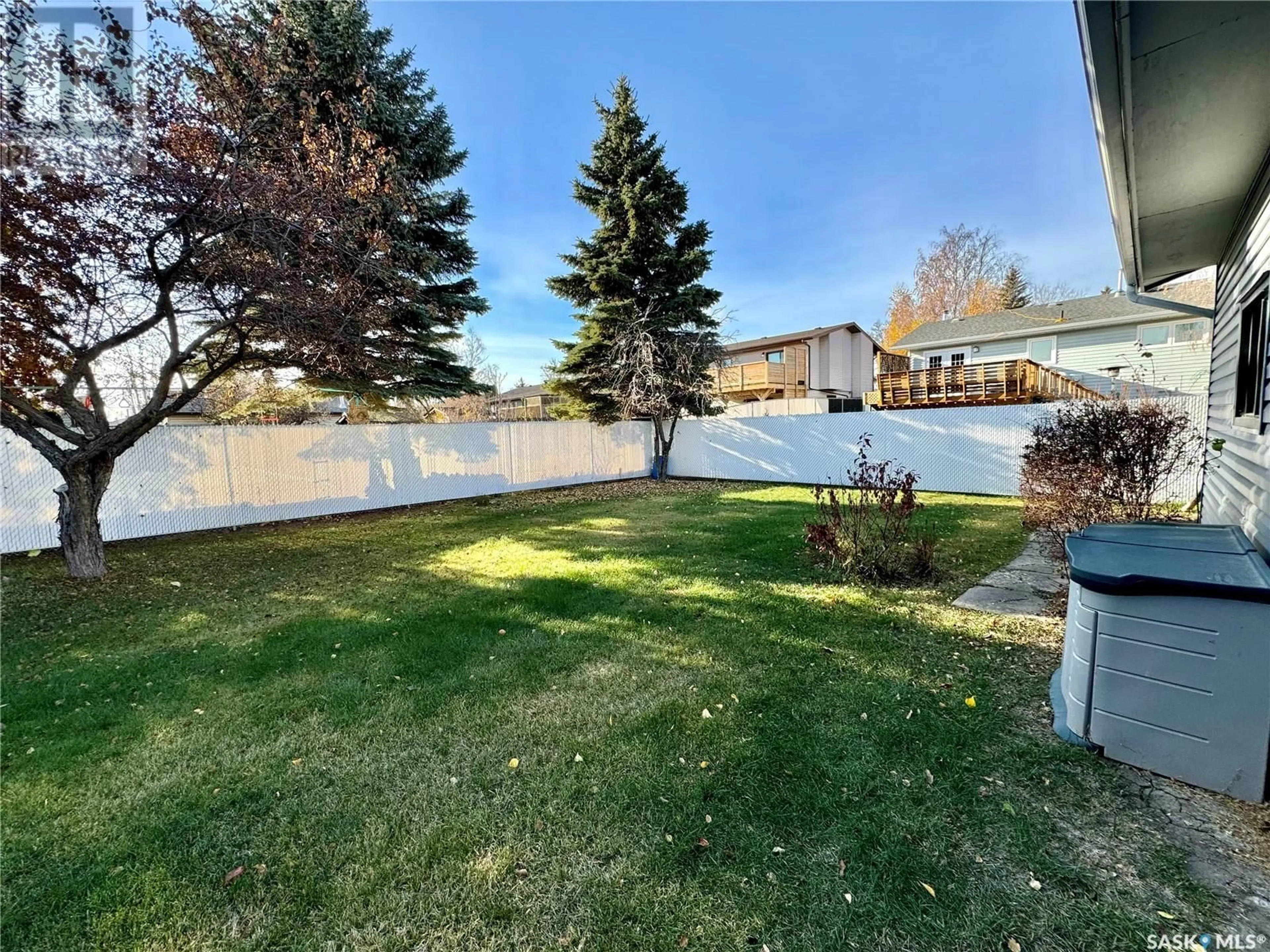 A pic from exterior of the house or condo, the fenced backyard for 2937 Bliss CRESCENT, Prince Albert Saskatchewan S6V7N8