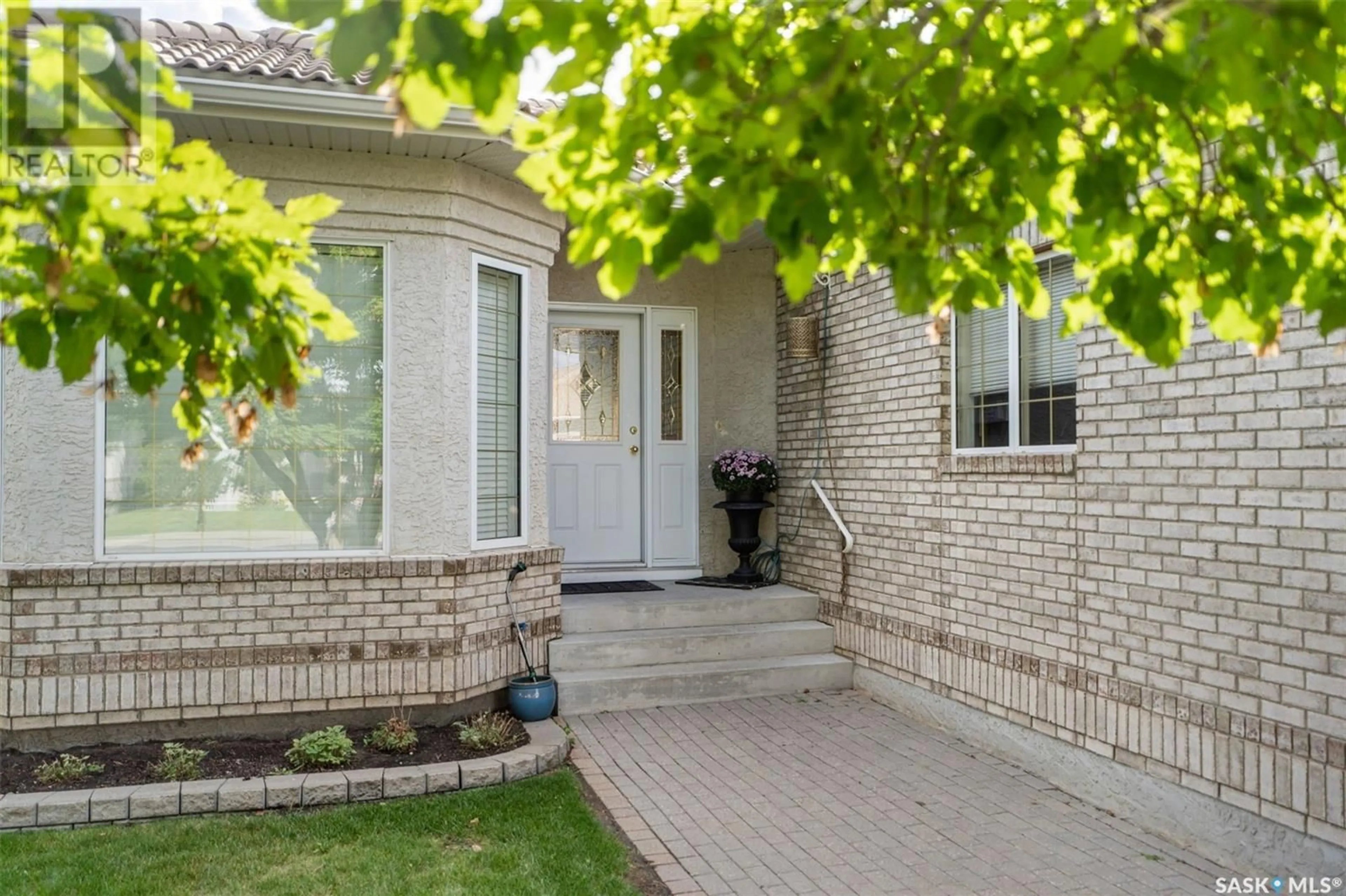 Home with brick exterior material for 15 315 Bayview CRESCENT, Saskatoon Saskatchewan S7B1V5