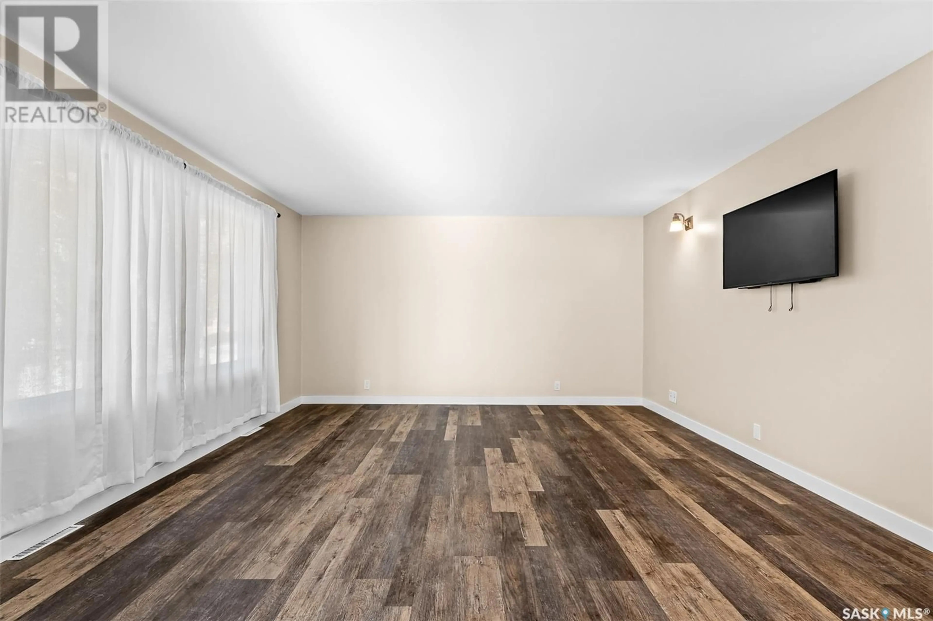 Media room, wood floors for 873 4th AVENUE NE, Moose Jaw Saskatchewan S6H1H8