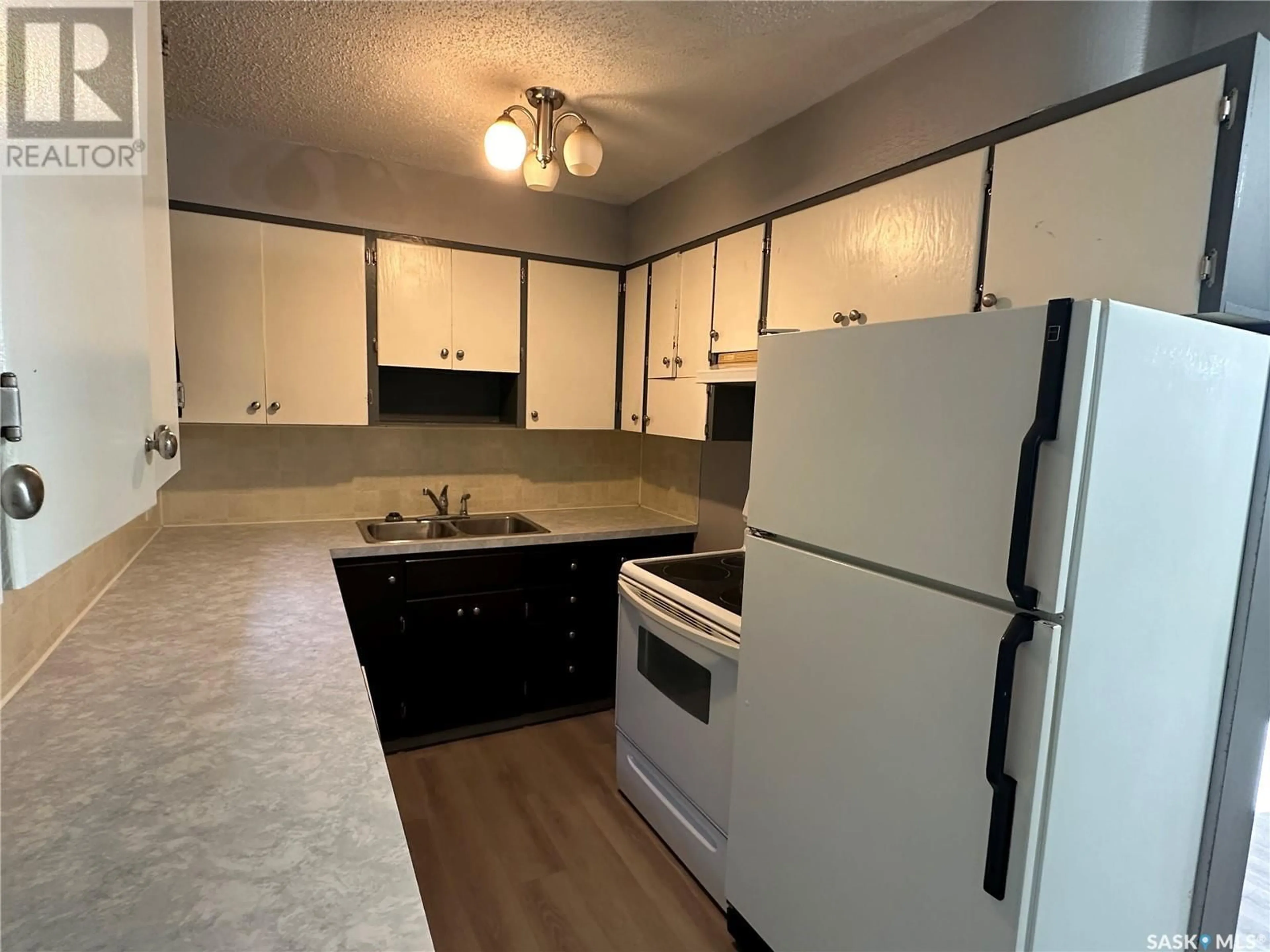 Standard kitchen, unknown floor, cottage for 1021 Bison AVENUE, Weyburn Saskatchewan S4H0K1