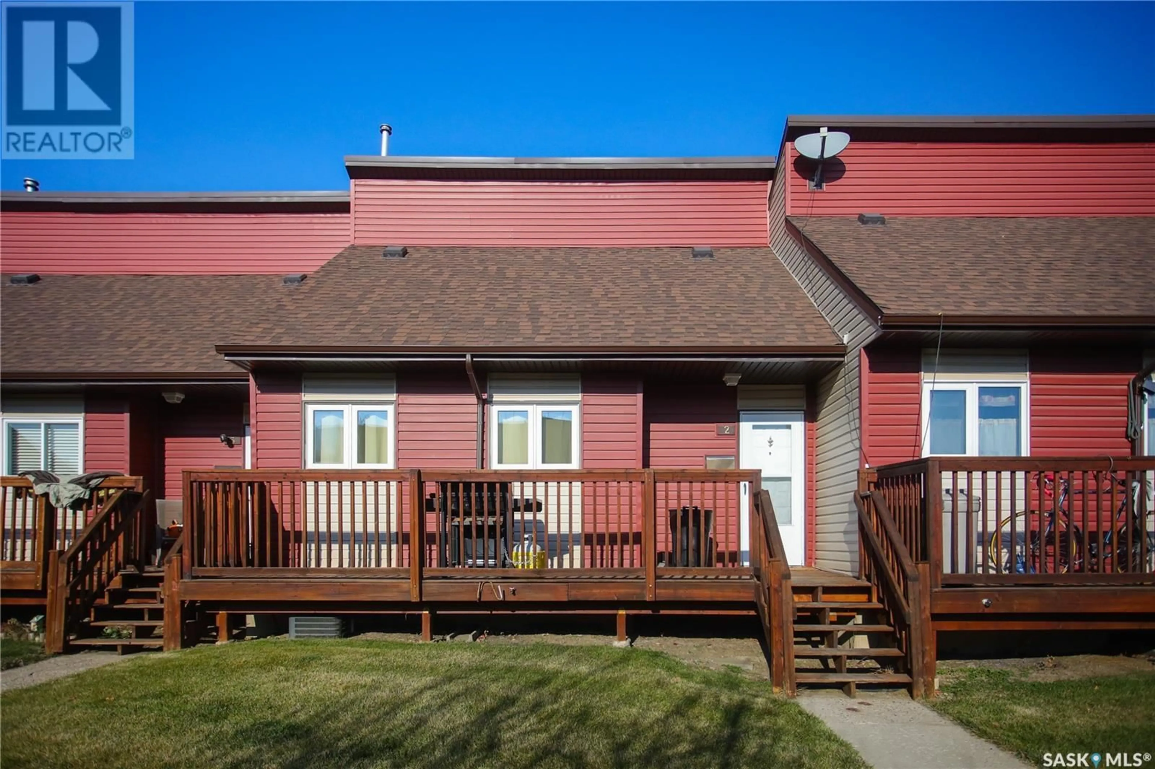 A pic from exterior of the house or condo, the fenced backyard for 2 331 Pendygrasse ROAD, Saskatoon Saskatchewan S7M4R3