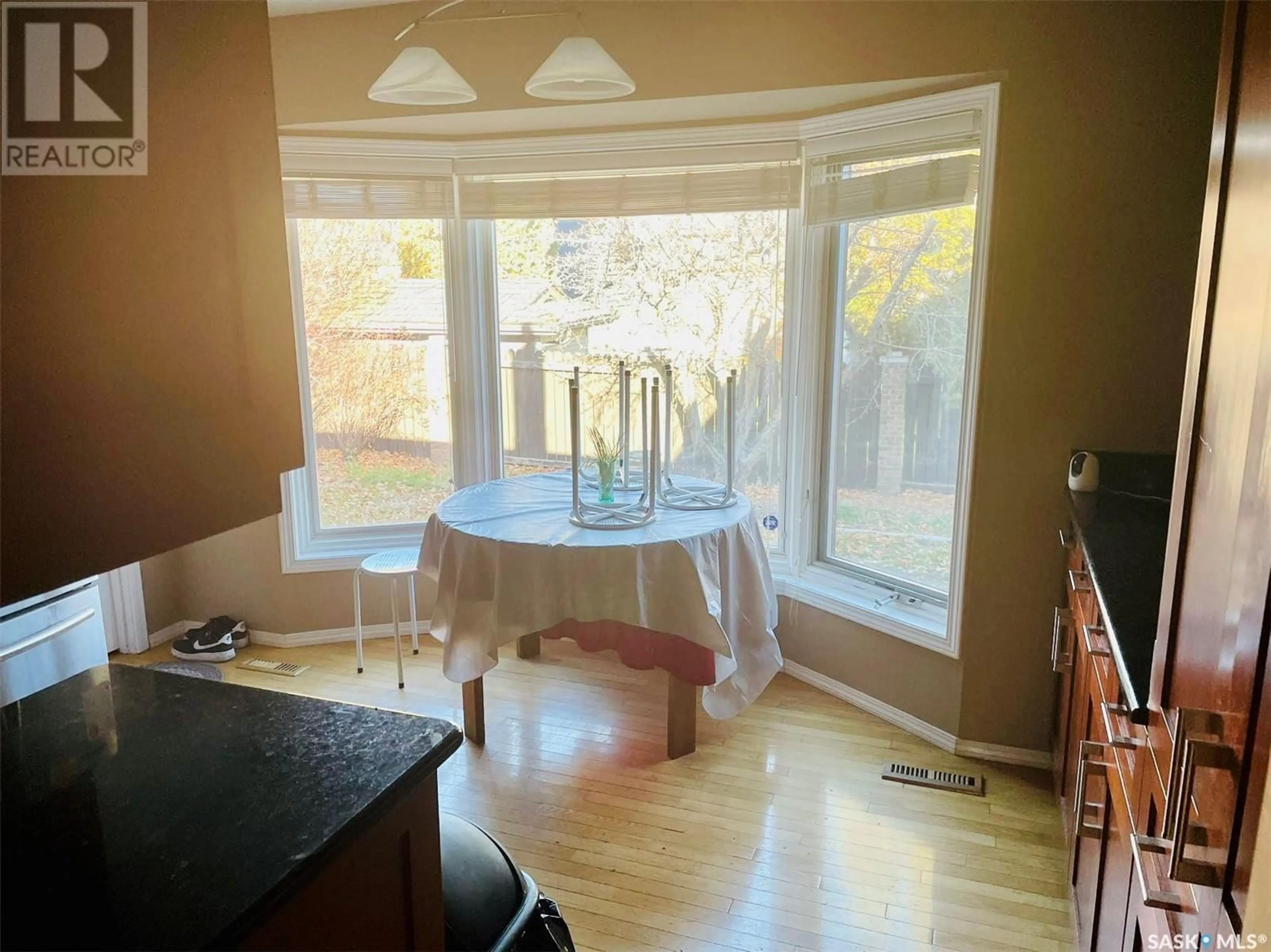 A pic of a room, wood floors for 311 Lakeshore COURT, Saskatoon Saskatchewan S7J3T6