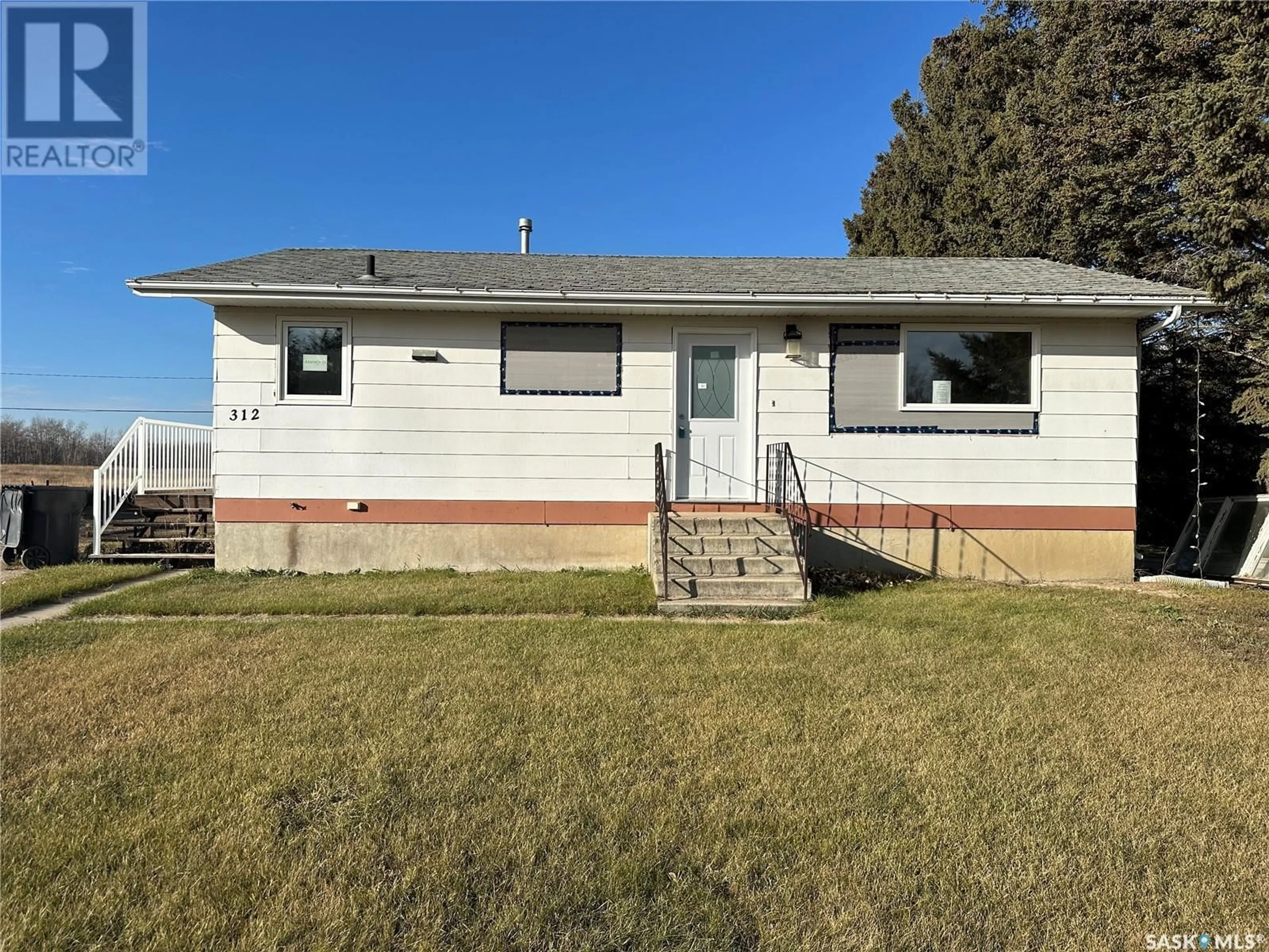 Frontside or backside of a home, cottage for 312 Main STREET, Lintlaw Saskatchewan S0A2H0