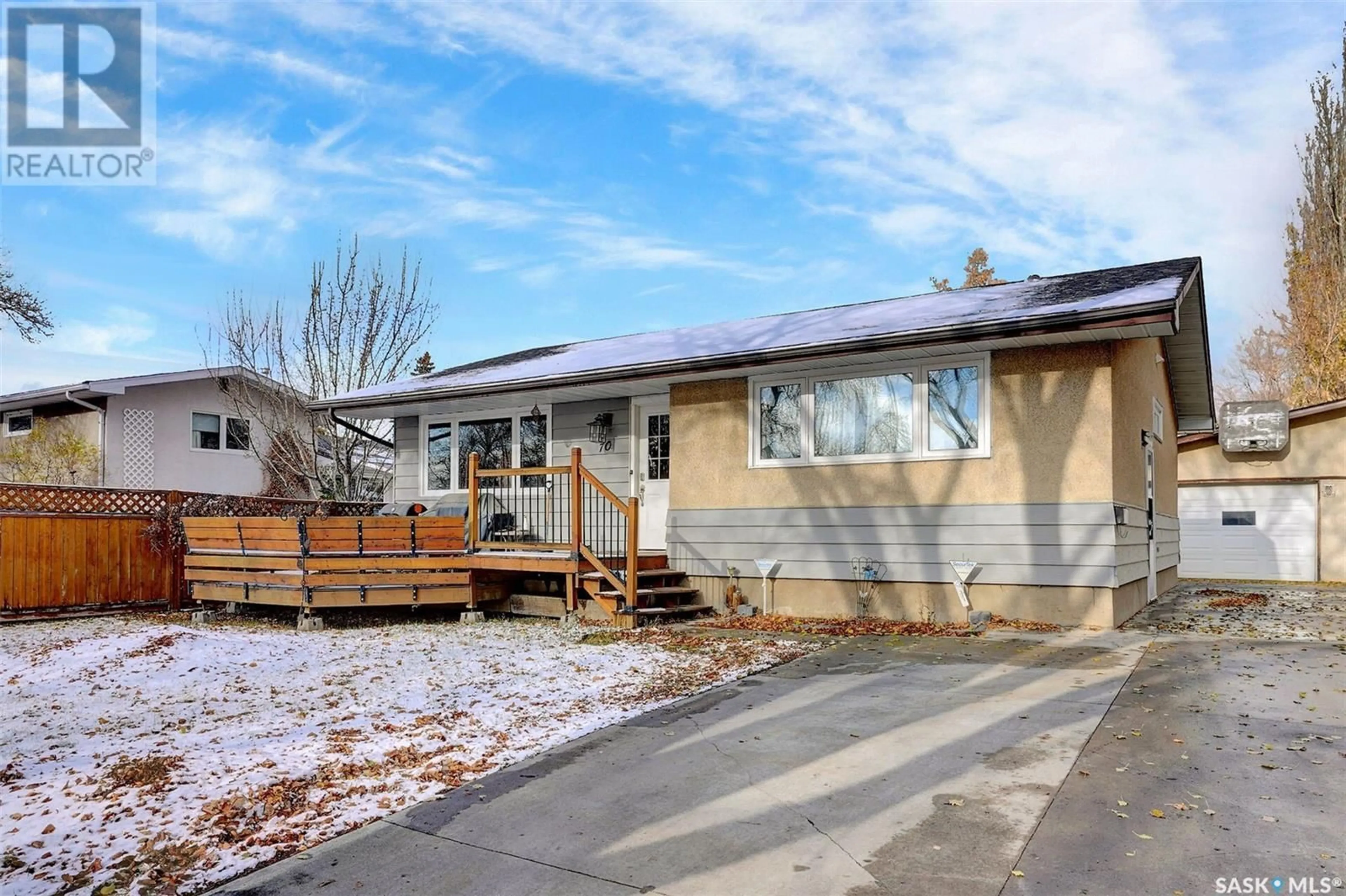 A pic from exterior of the house or condo, the fenced backyard for 70 Fairview ROAD, Regina Saskatchewan S4R0A7