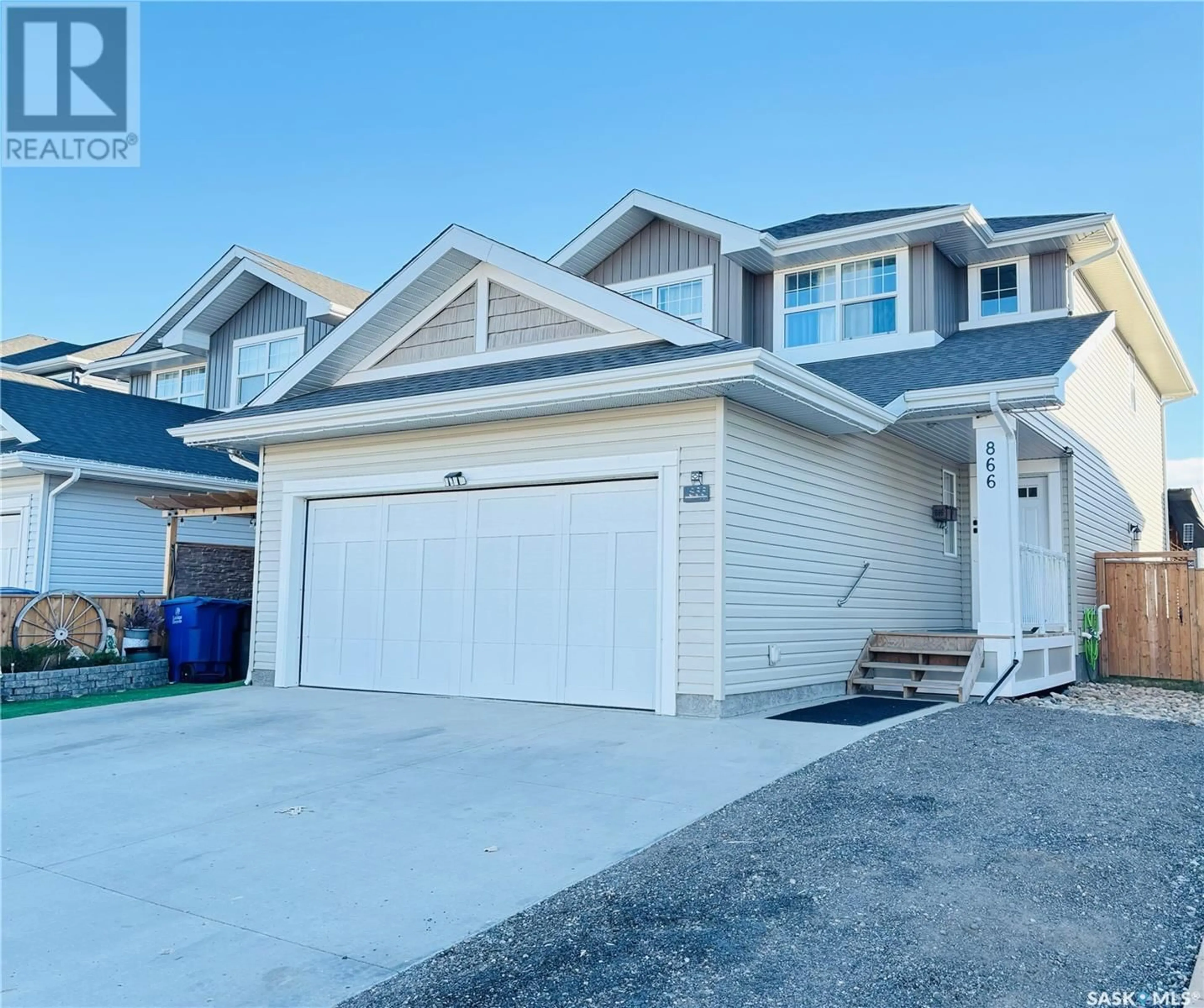 A pic from exterior of the house or condo, the street view for 866 Childers RISE, Saskatoon Saskatchewan S7L6T9