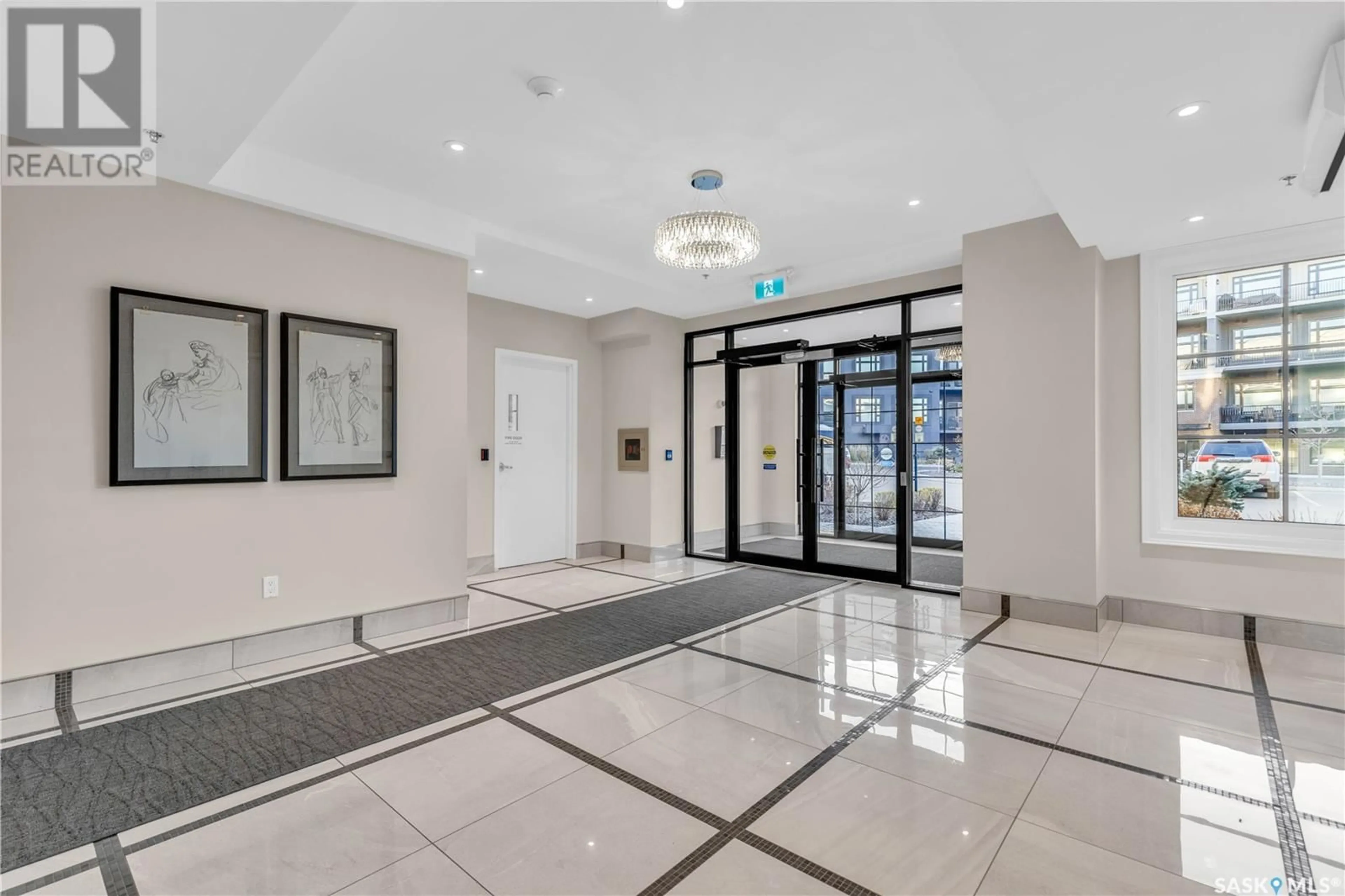 Indoor foyer, cement floor for 312 408 Cartwright STREET, Saskatoon Saskatchewan S7T0X1