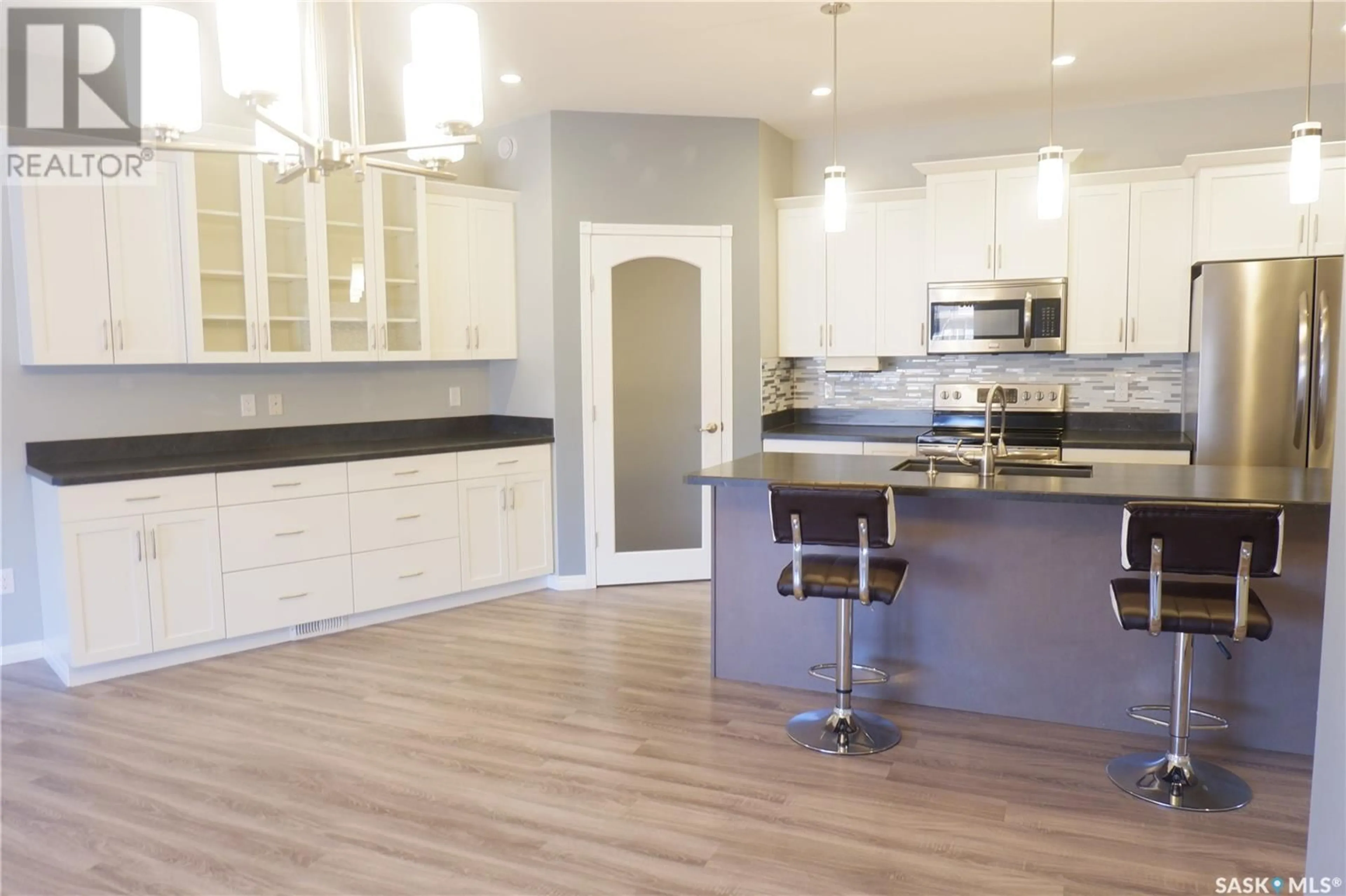 Open concept kitchen for 604 Centre STREET, Assiniboia Saskatchewan S0H0B0