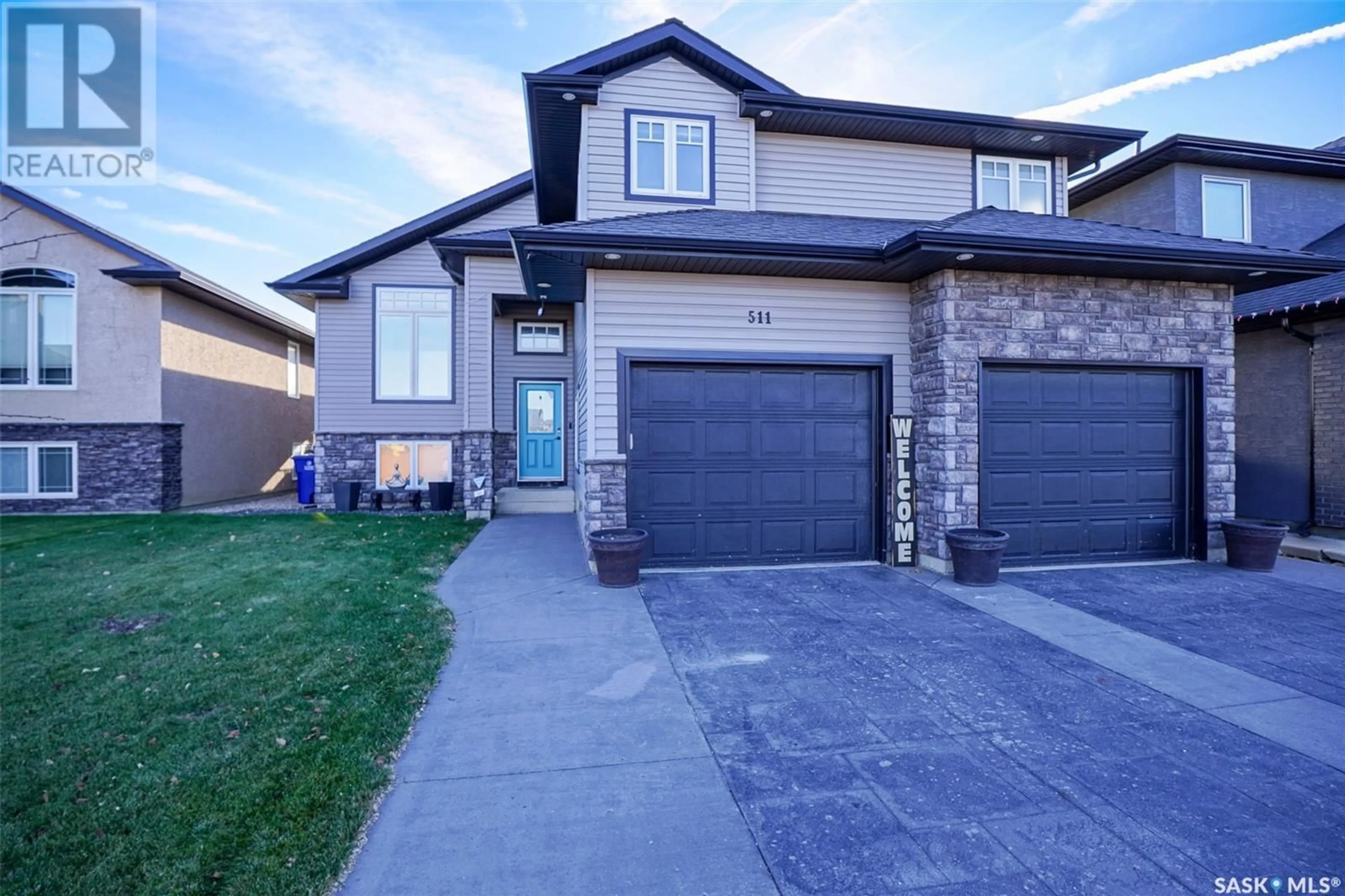 Frontside or backside of a home, the street view for 511 Padget CRESCENT, Saskatoon Saskatchewan S7W0H4