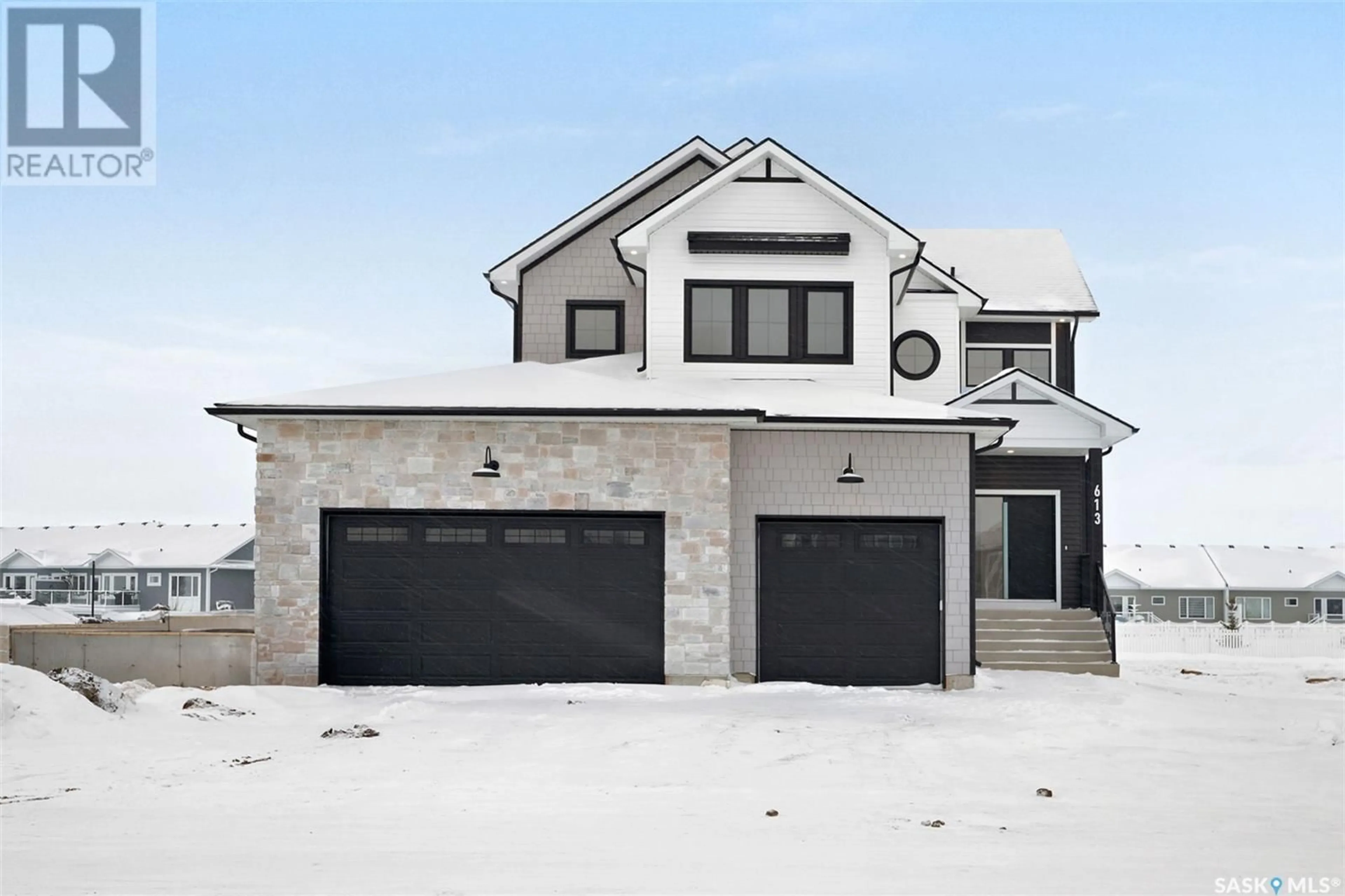 Home with brick exterior material, street for 613 WEIR CRESCENT, Warman Saskatchewan S0K4S4