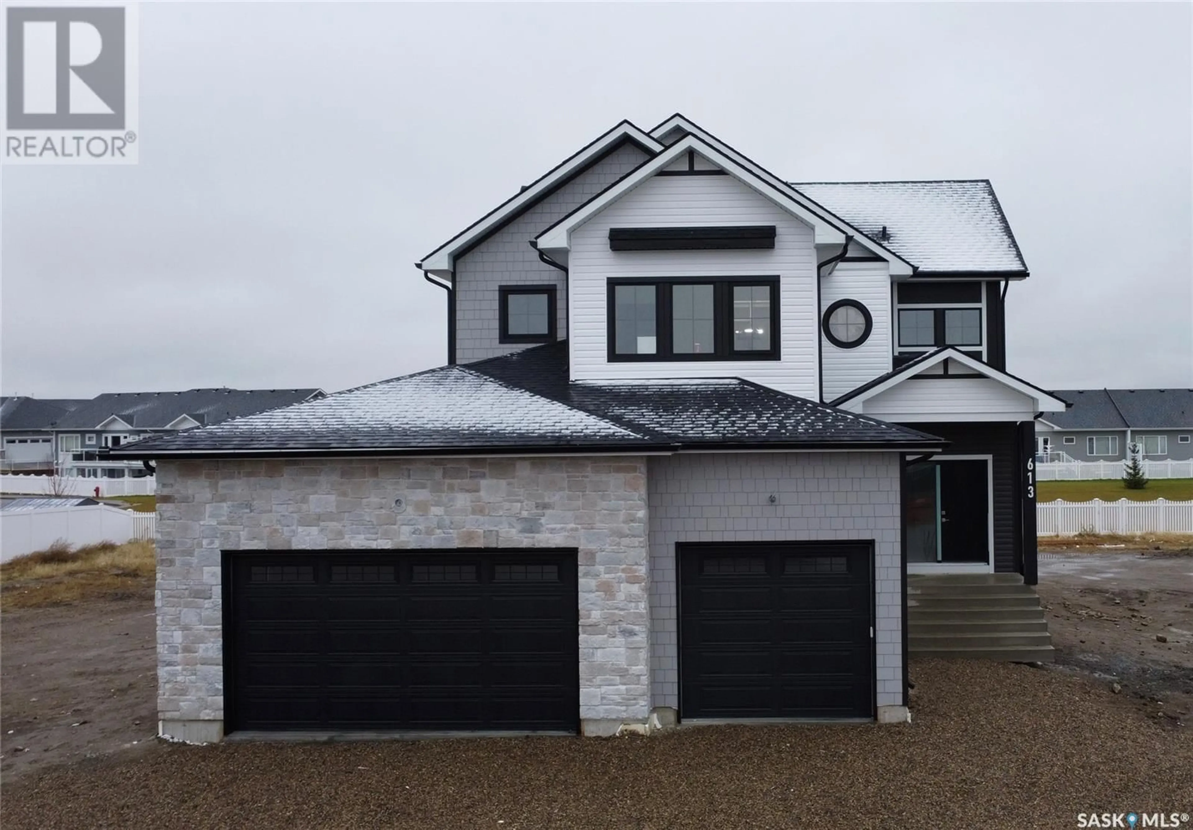 Frontside or backside of a home, cottage for 613 Weir CRESCENT, Warman Saskatchewan S0K4S4