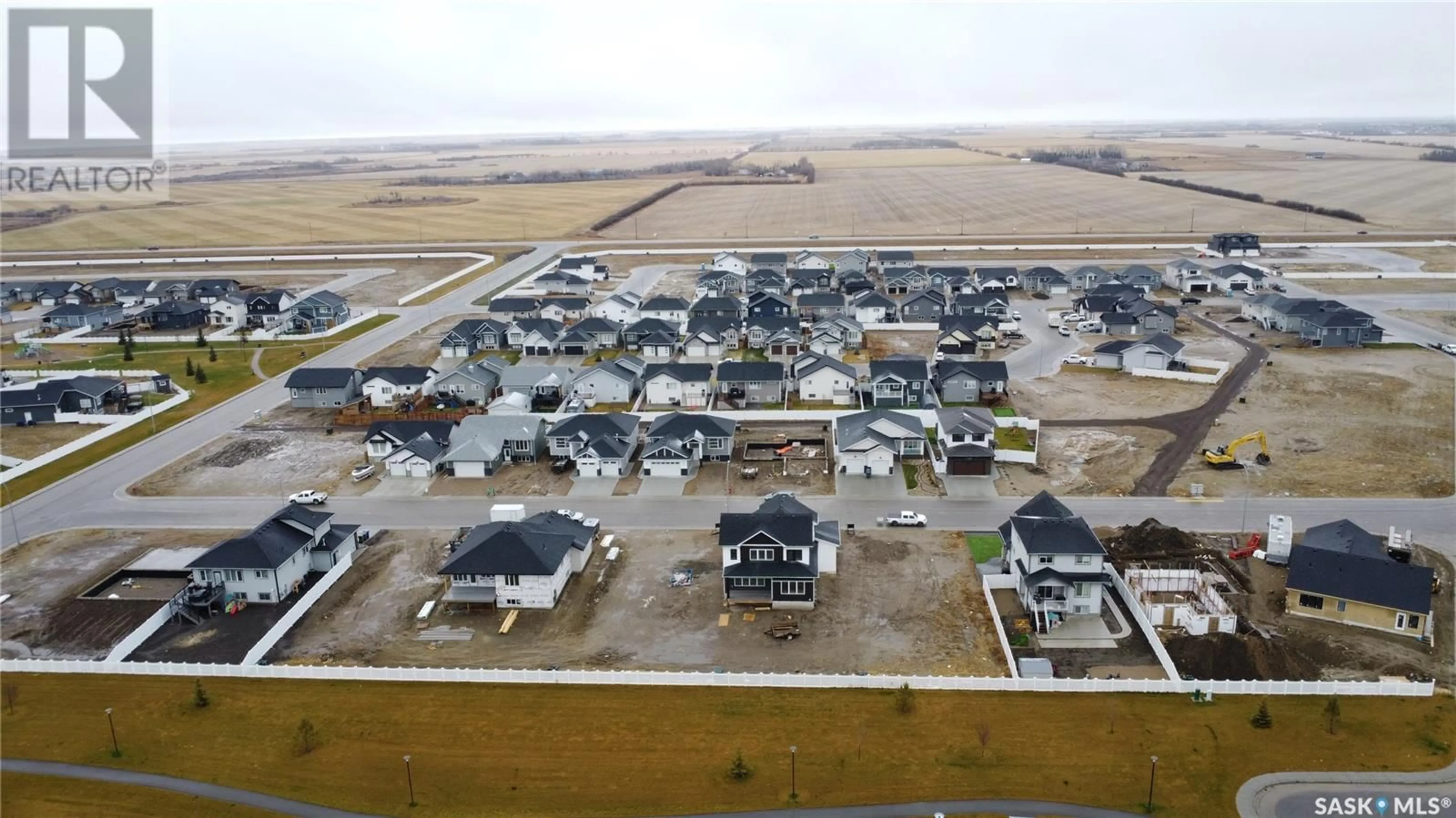 A pic from exterior of the house or condo, the street view for 613 Weir CRESCENT, Warman Saskatchewan S0K4S4