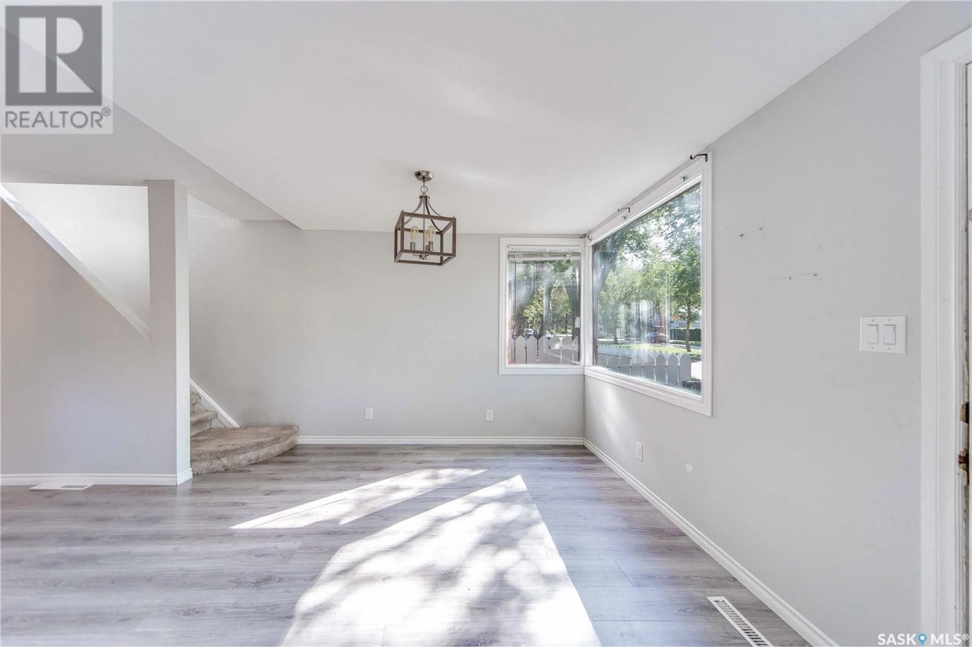 A pic of a room, wood floors for 622 31st STREET W, Saskatoon Saskatchewan S7L0R3