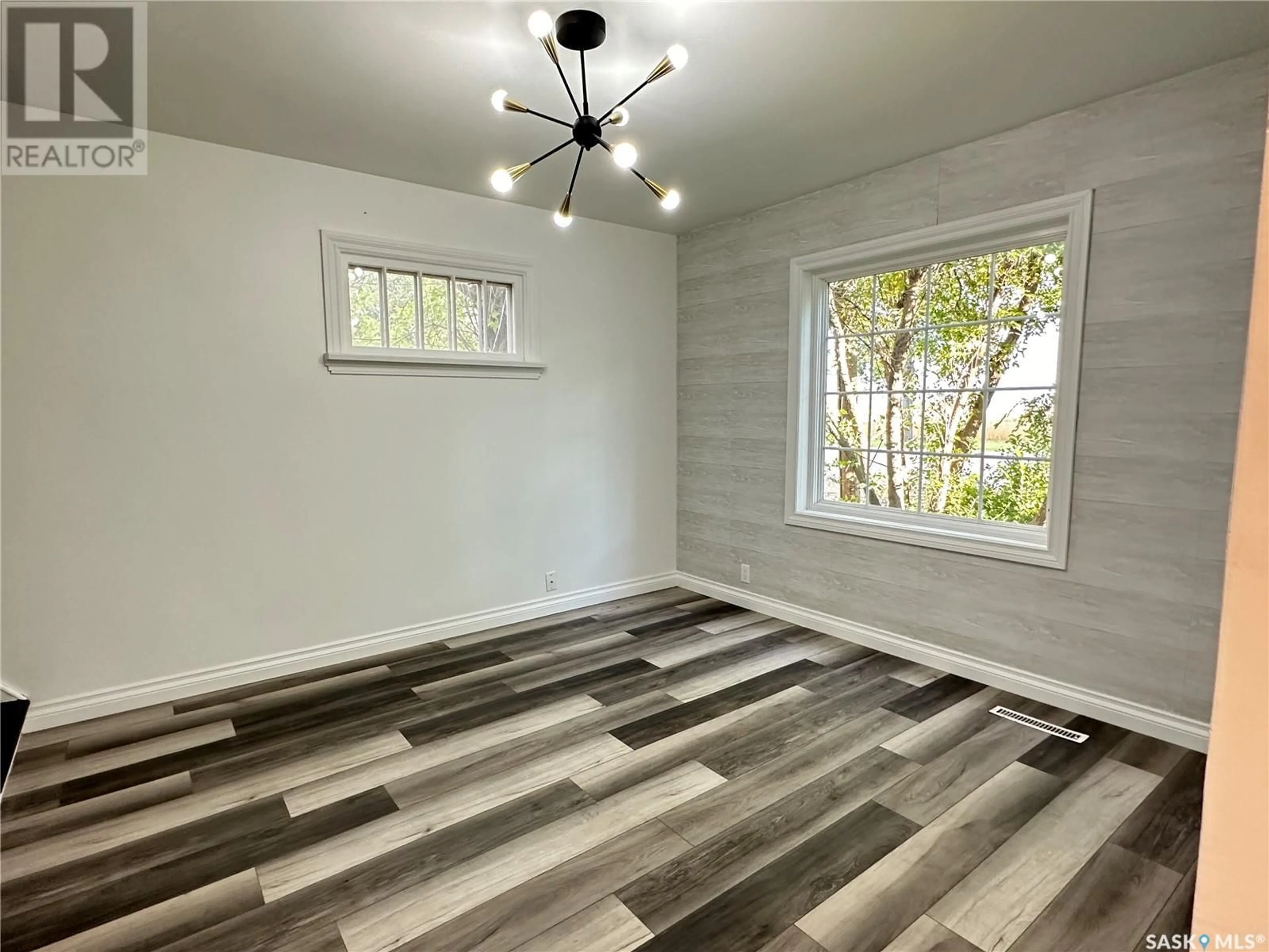 A pic of a room, wood floors for 200 South ROAD, Midale Saskatchewan S0C1S0