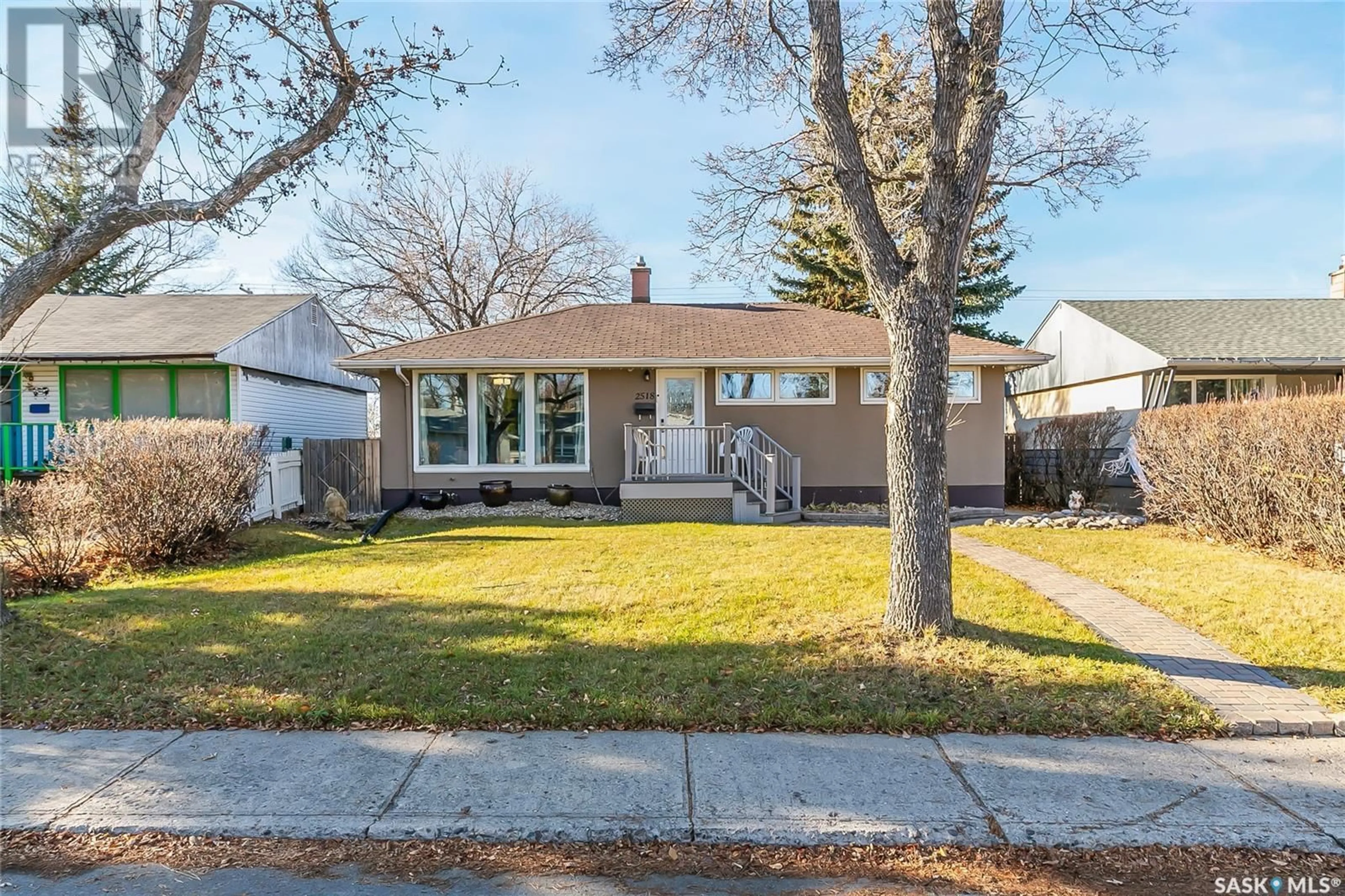 Frontside or backside of a home, the fenced backyard for 2518 Edward STREET, Regina Saskatchewan S4S0M8