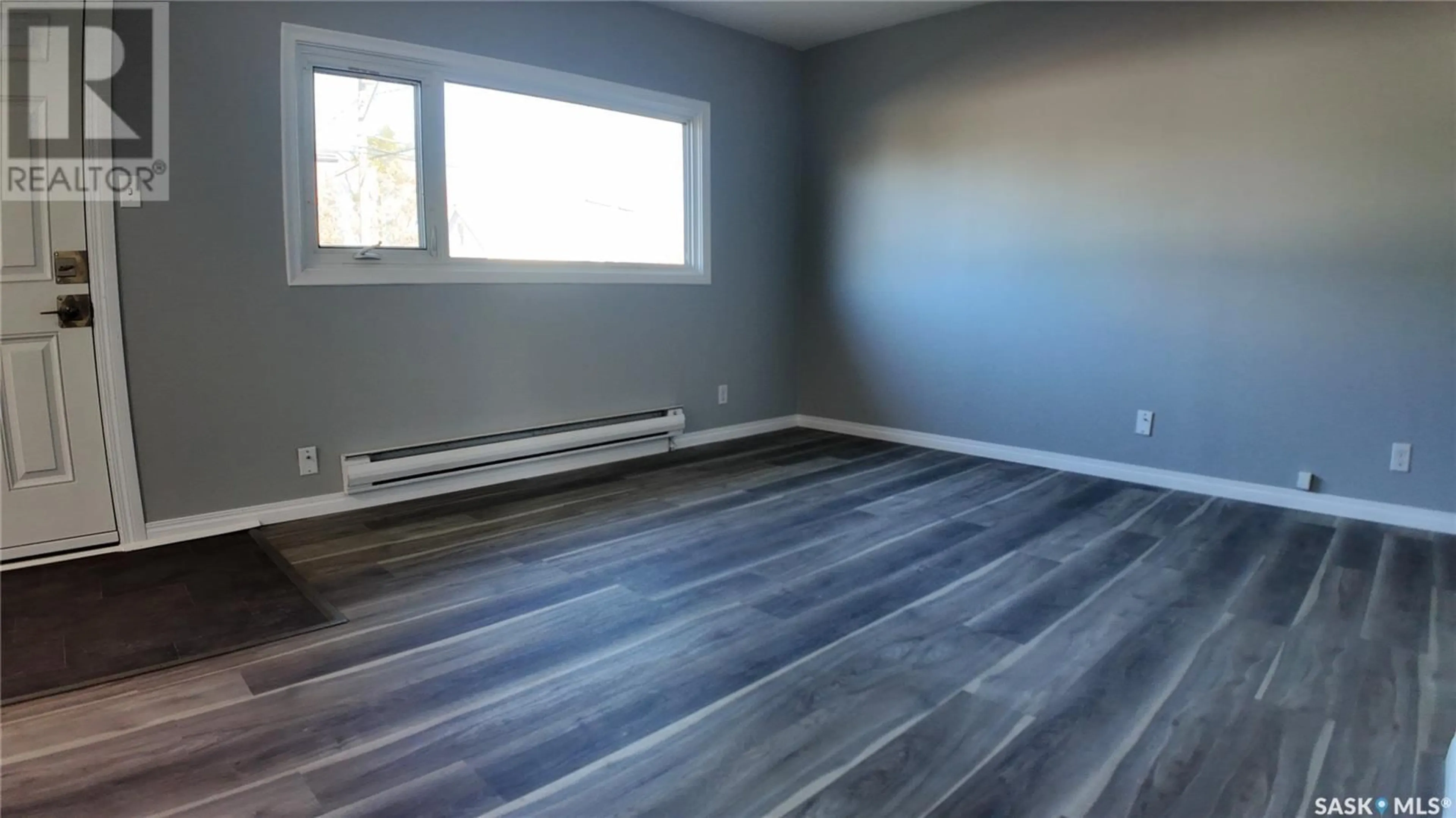 A pic of a room, wood floors for A & B 892 111th STREET, North Battleford Saskatchewan S9A2K1