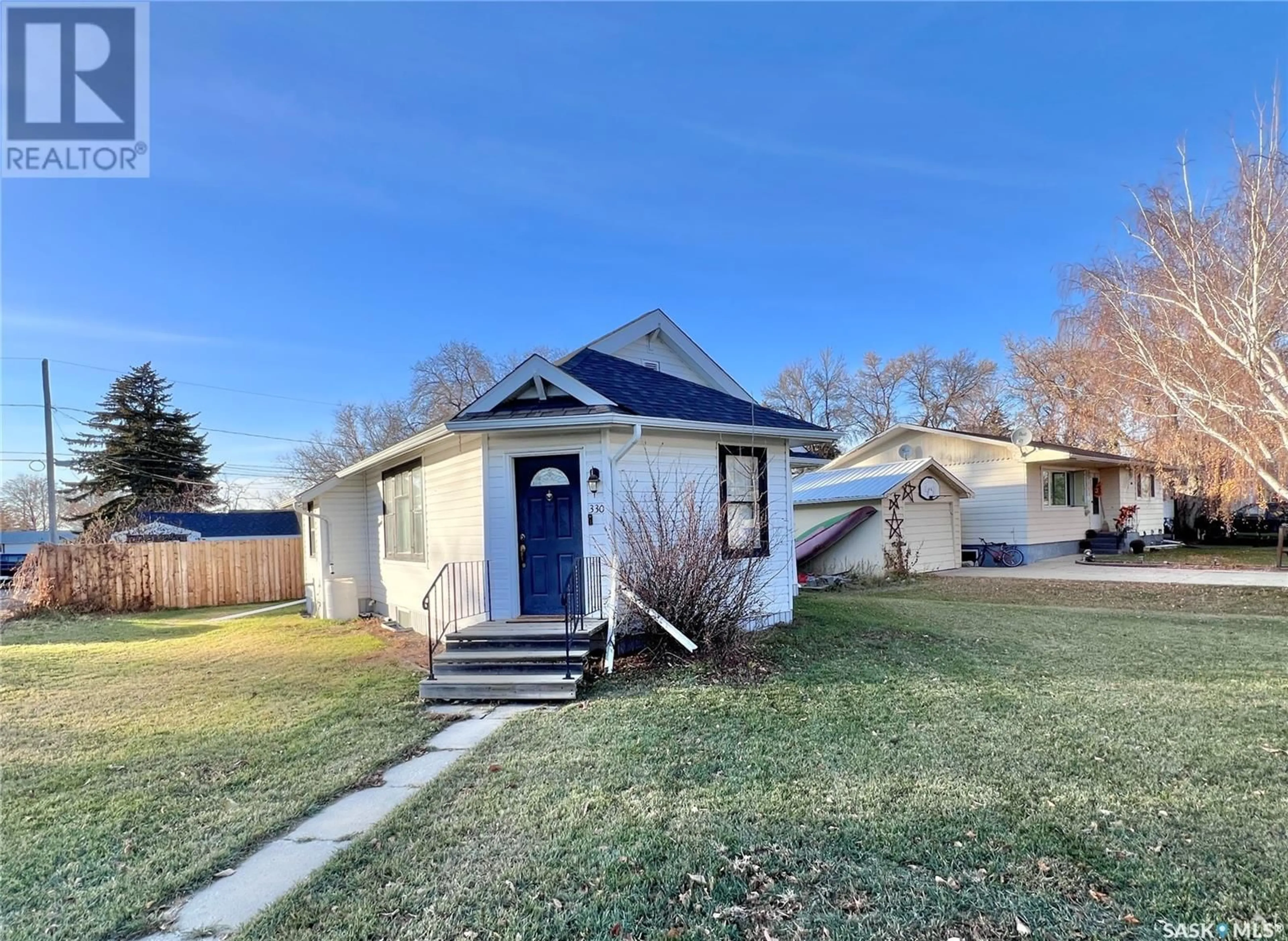 Frontside or backside of a home, cottage for 330 Thomson STREET, Outlook Saskatchewan S0L2N0