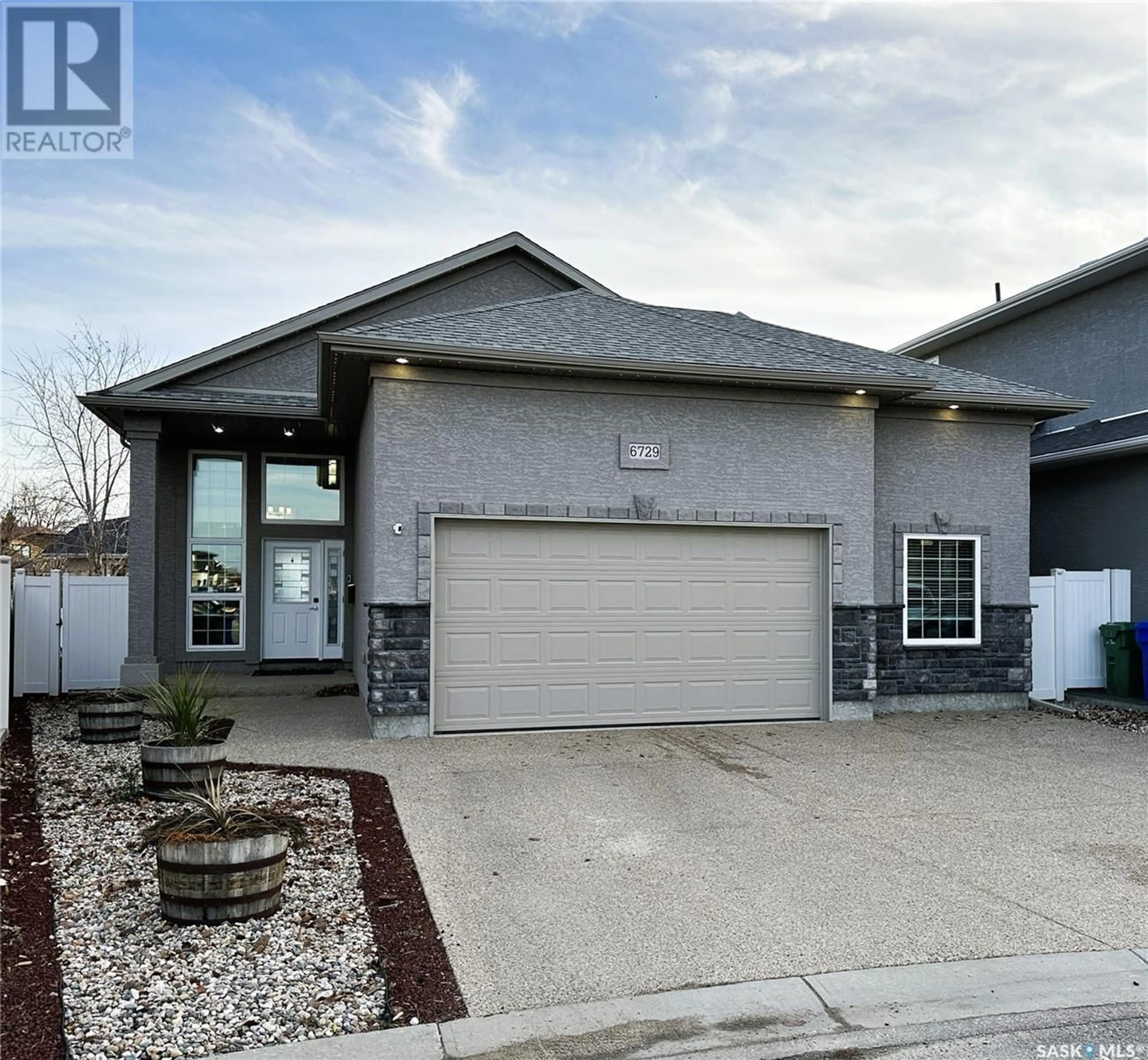 Frontside or backside of a home, the street view for 6729 Maple Vista DRIVE, Regina Saskatchewan S4X0J5