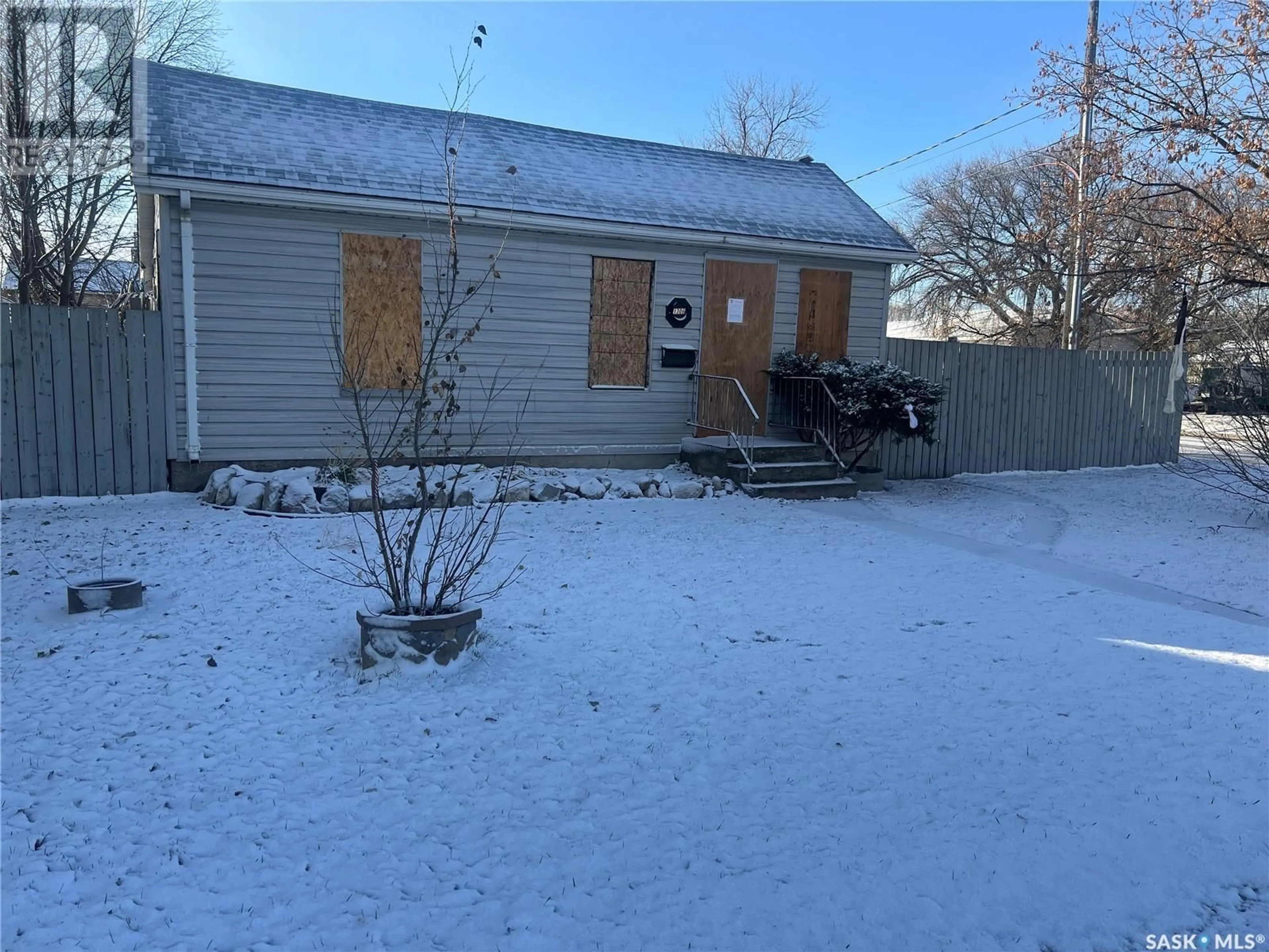 Frontside or backside of a home, the fenced backyard for 1306 South Railway STREET E, Swift Current Saskatchewan S9H3B8