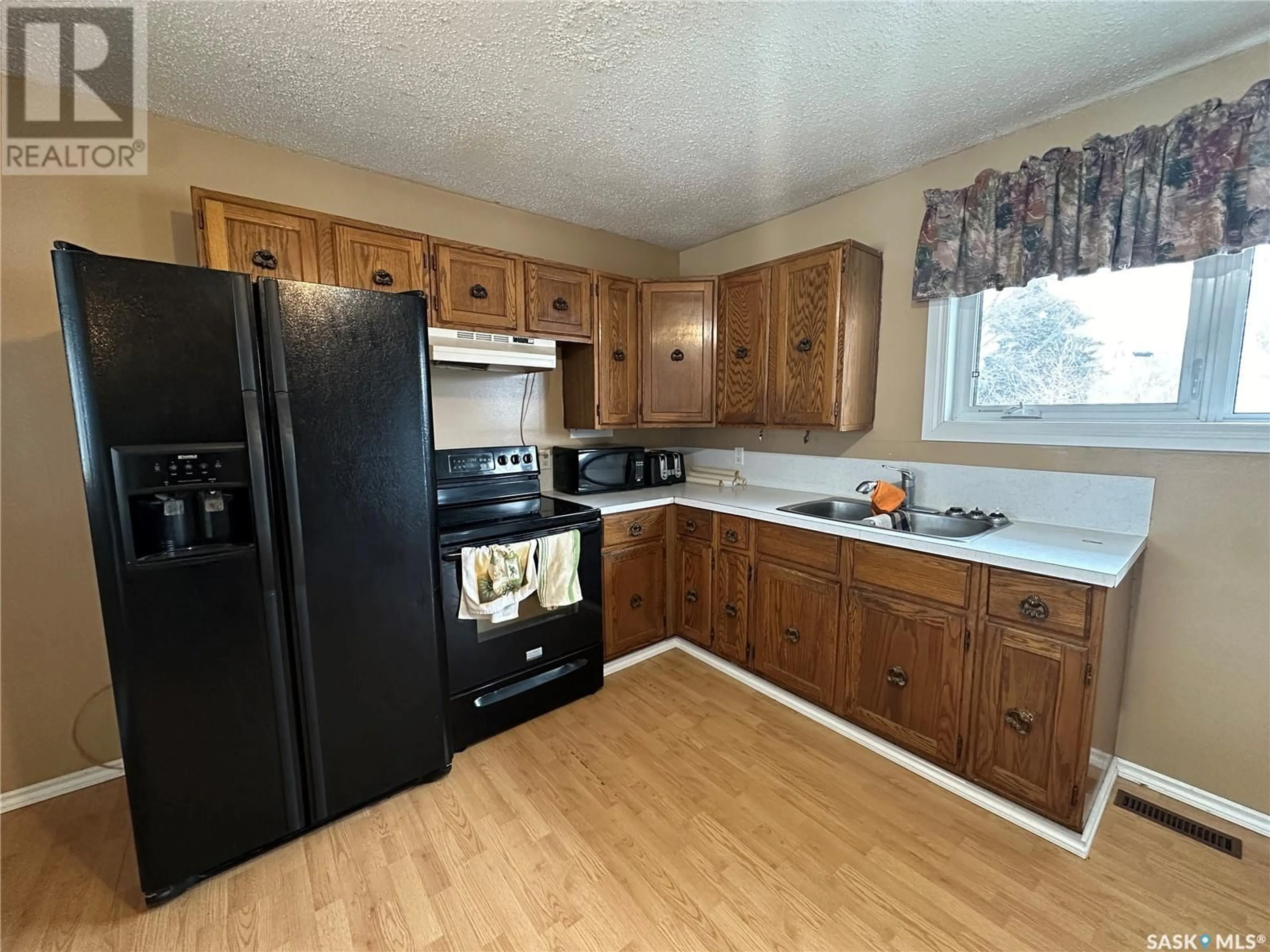 Standard kitchen, wood floors, cottage for 109 Henry STREET, Sheho Saskatchewan S0A3T0