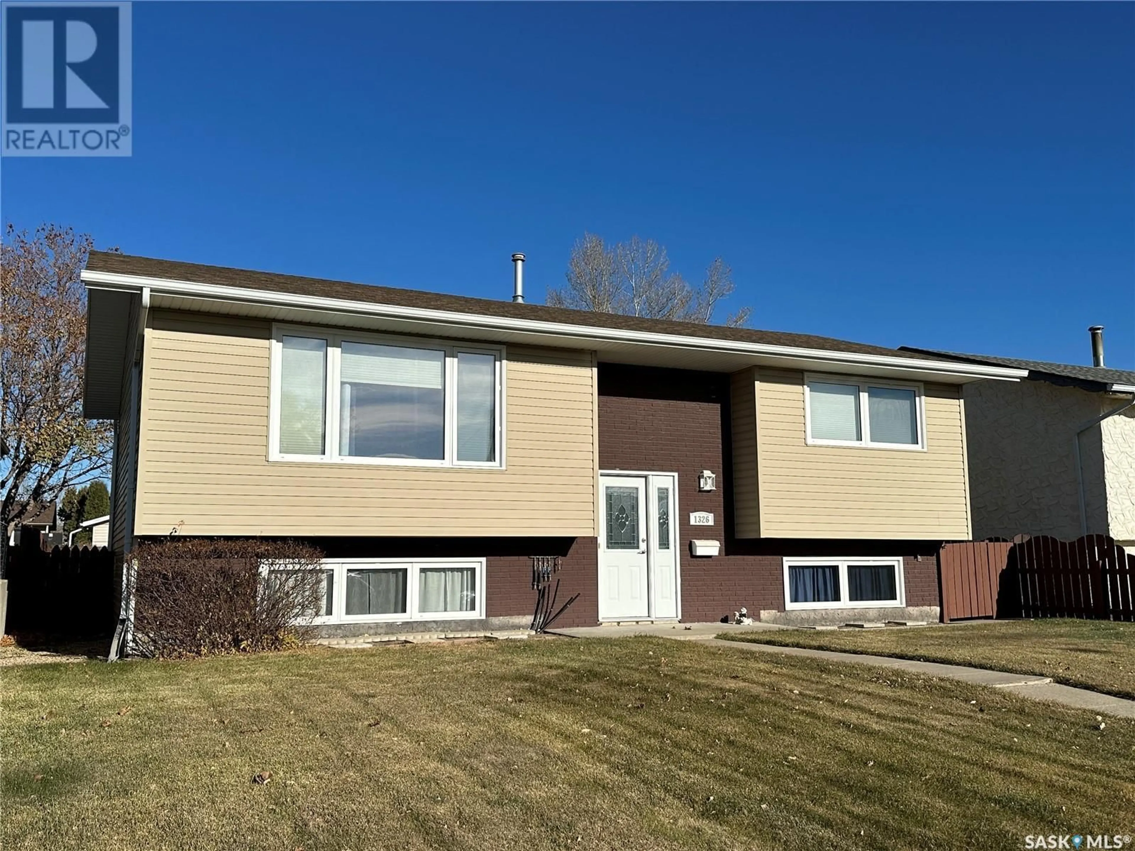 Frontside or backside of a home, the front or back of building for 1326 Glendale STREET, Moose Jaw Saskatchewan S6H6Y9