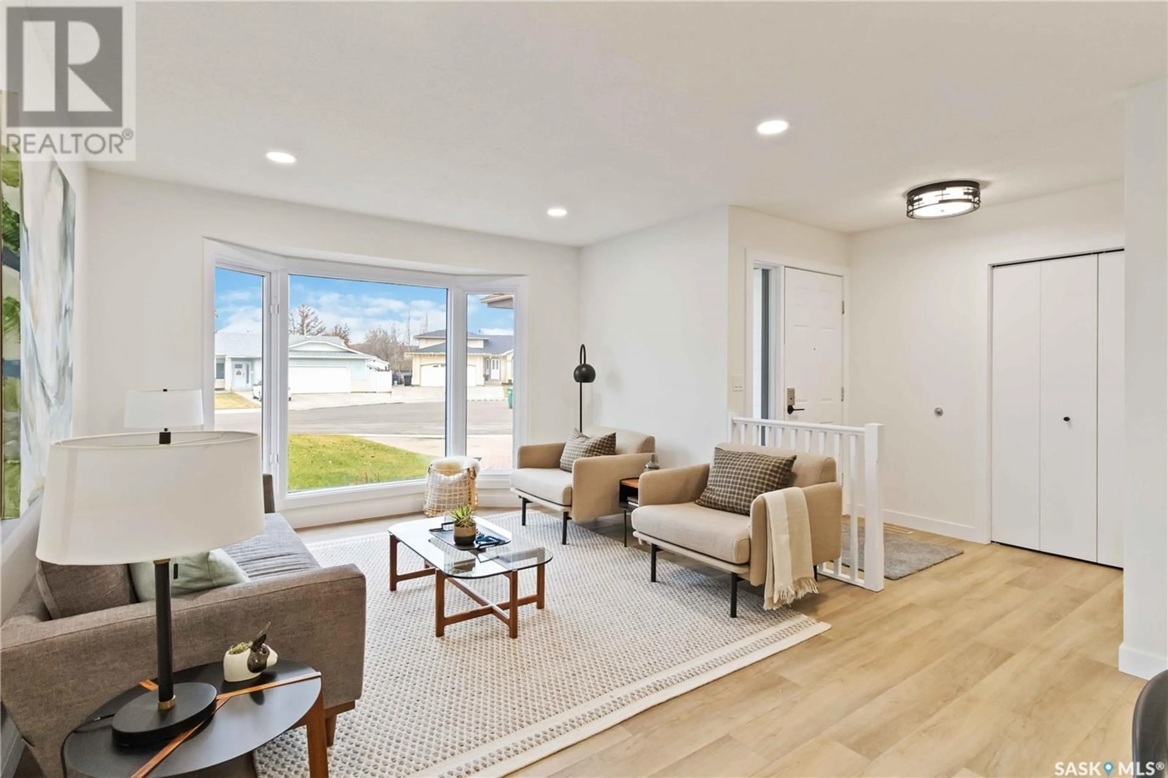 Living room, wood floors for 242 Anglin PLACE, Saskatoon Saskatchewan S7J5E9