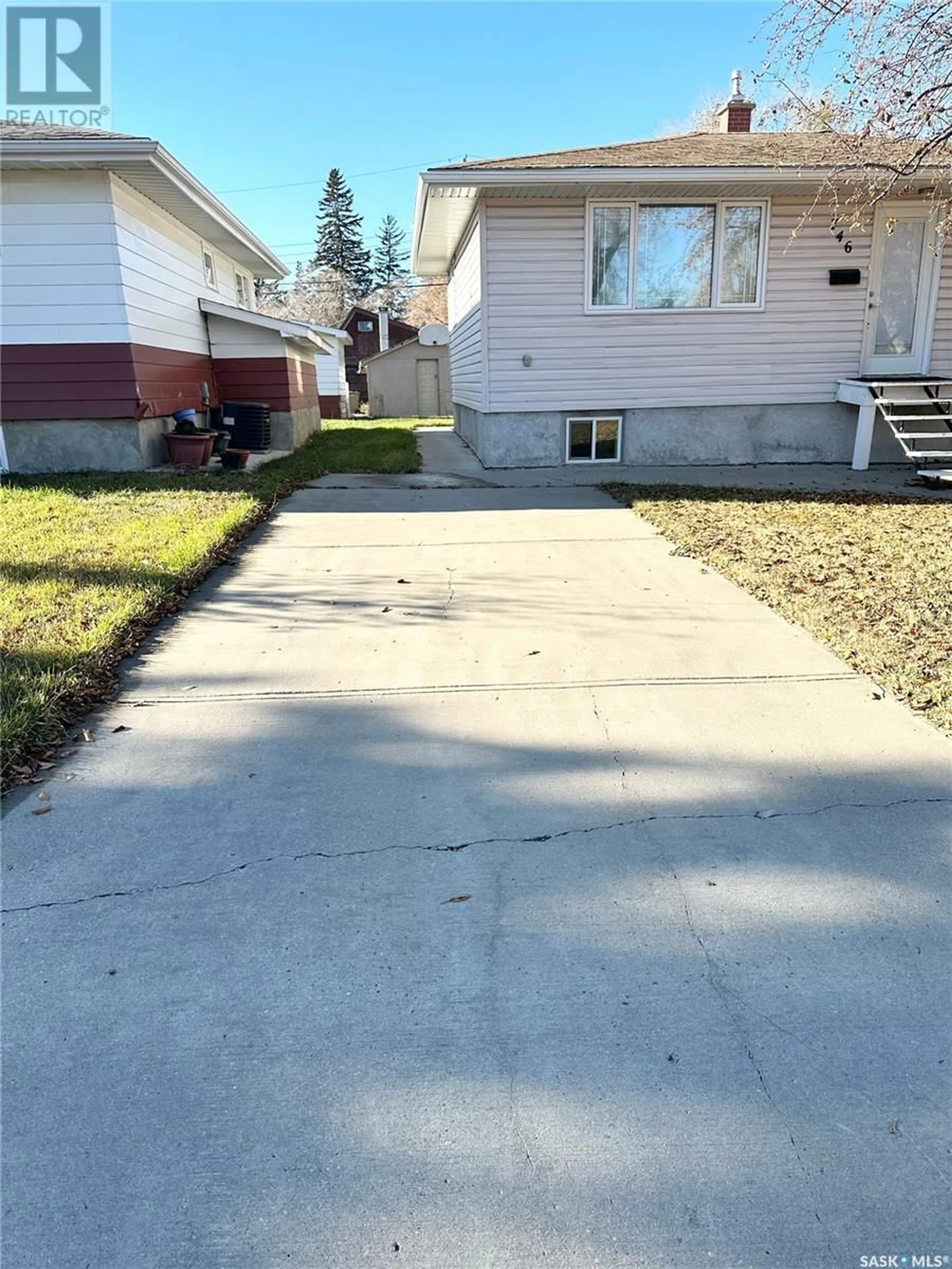 Frontside or backside of a home, the fenced backyard for 746 Montague STREET, Regina Saskatchewan S4T3G9