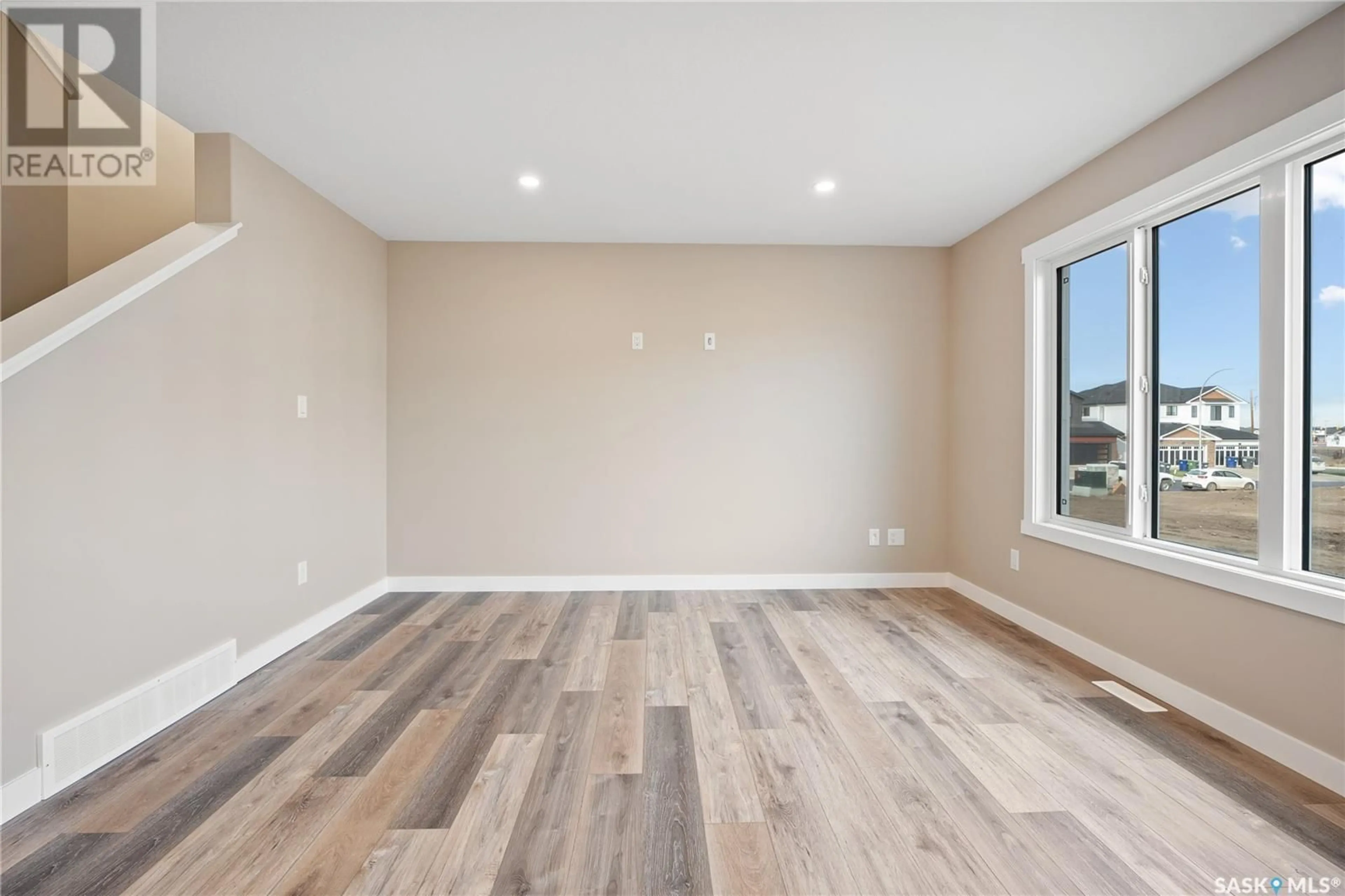 A pic of a room, wood floors for 4797 Ferndale CRESCENT, Regina Saskatchewan S4V4A5