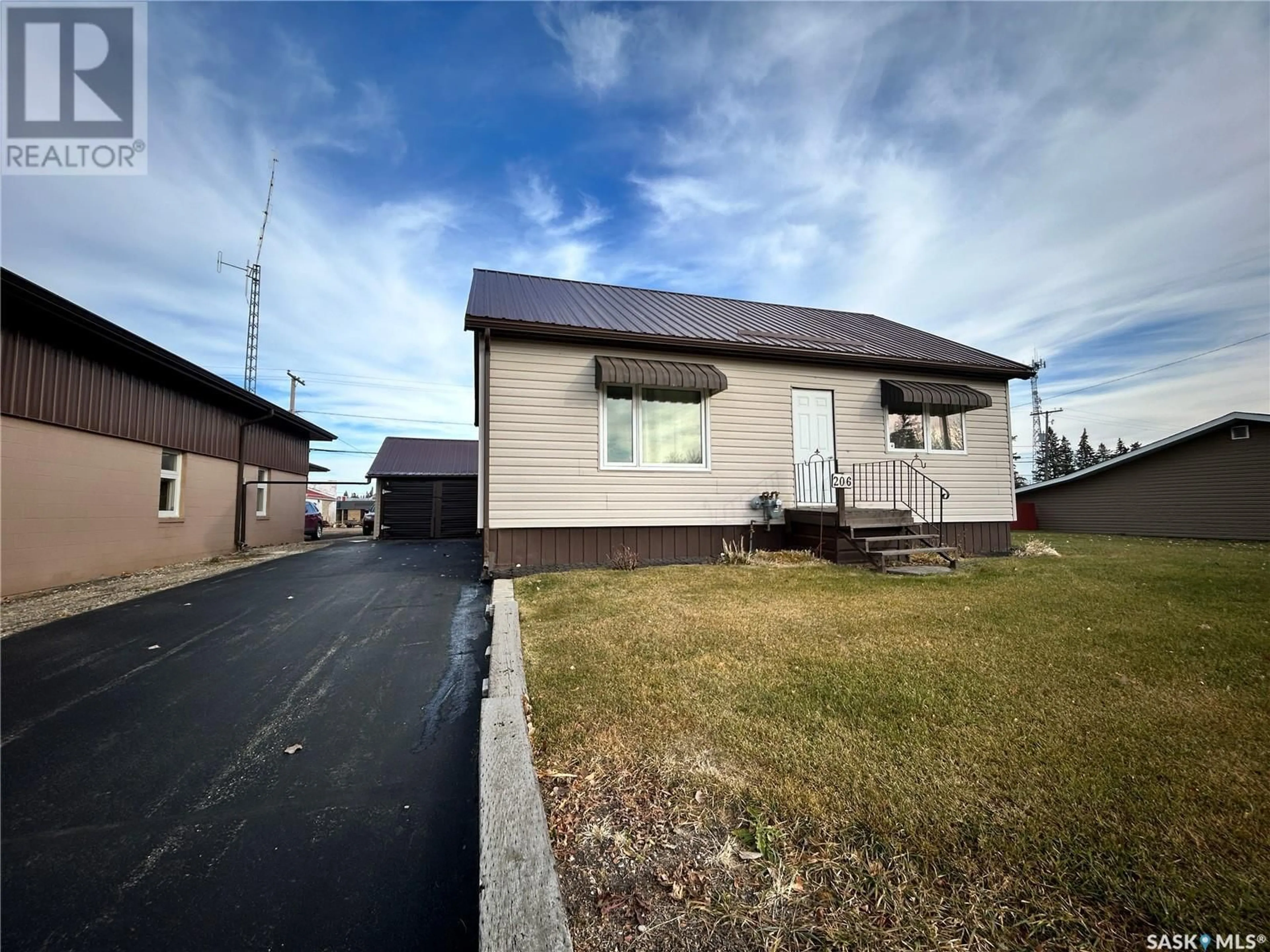 Frontside or backside of a home, the front or back of building for 206 Wells AVENUE E, Langenburg Saskatchewan S0A2A0