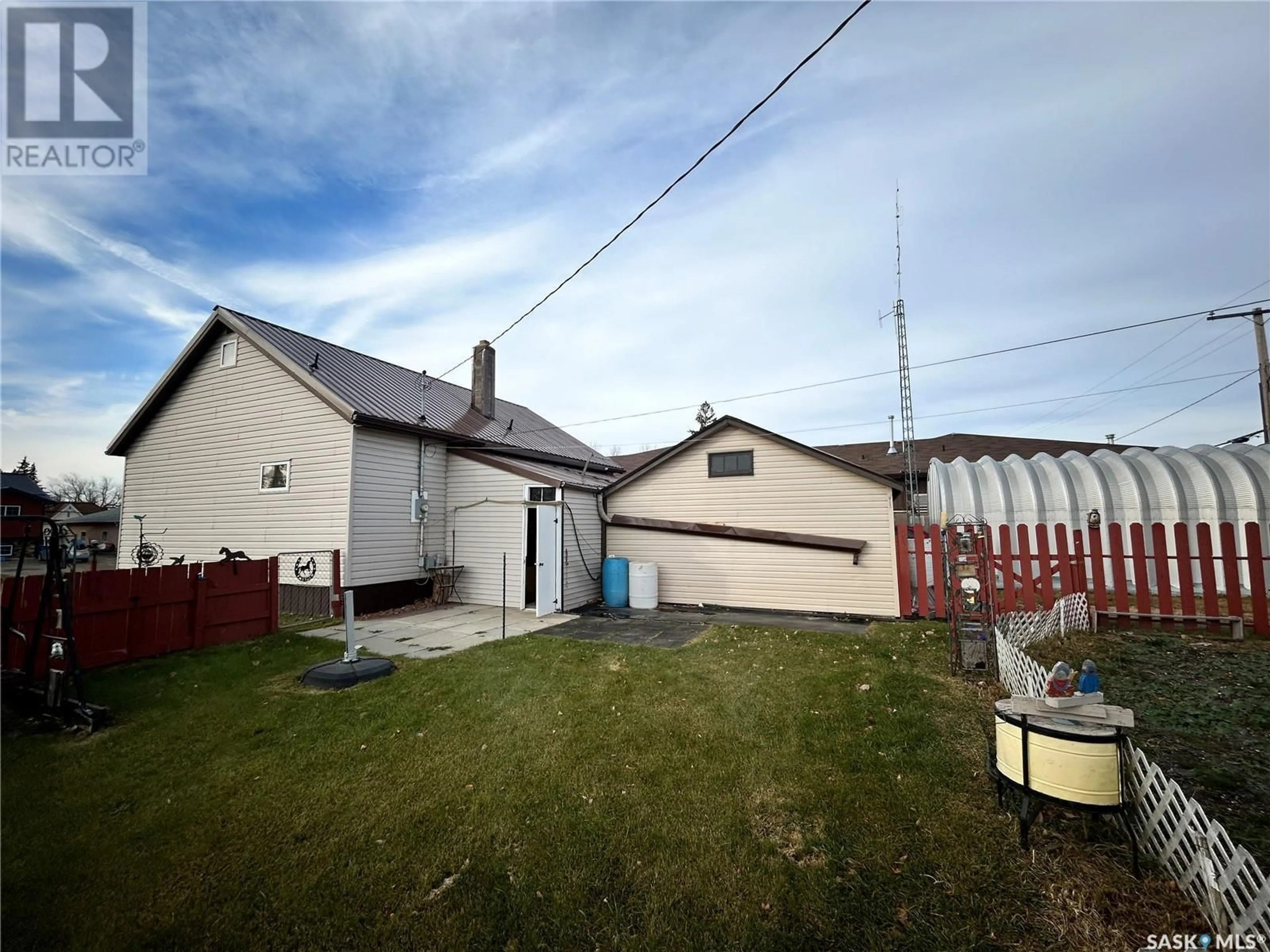 Frontside or backside of a home, the fenced backyard for 206 Wells AVENUE E, Langenburg Saskatchewan S0A2A0