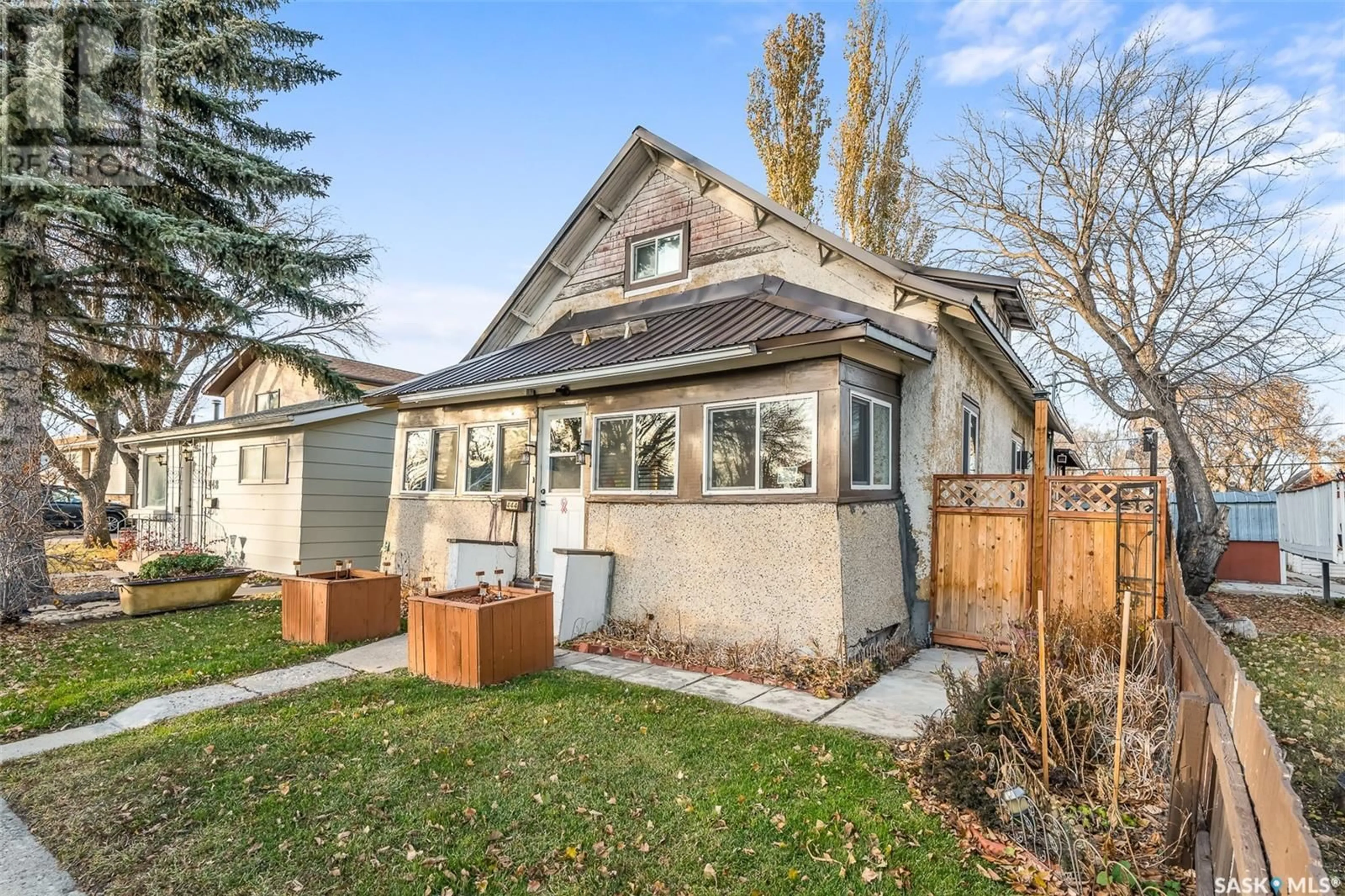 A pic from exterior of the house or condo, the fenced backyard for 444 Grandview STREET W, Moose Jaw Saskatchewan S6H5L1