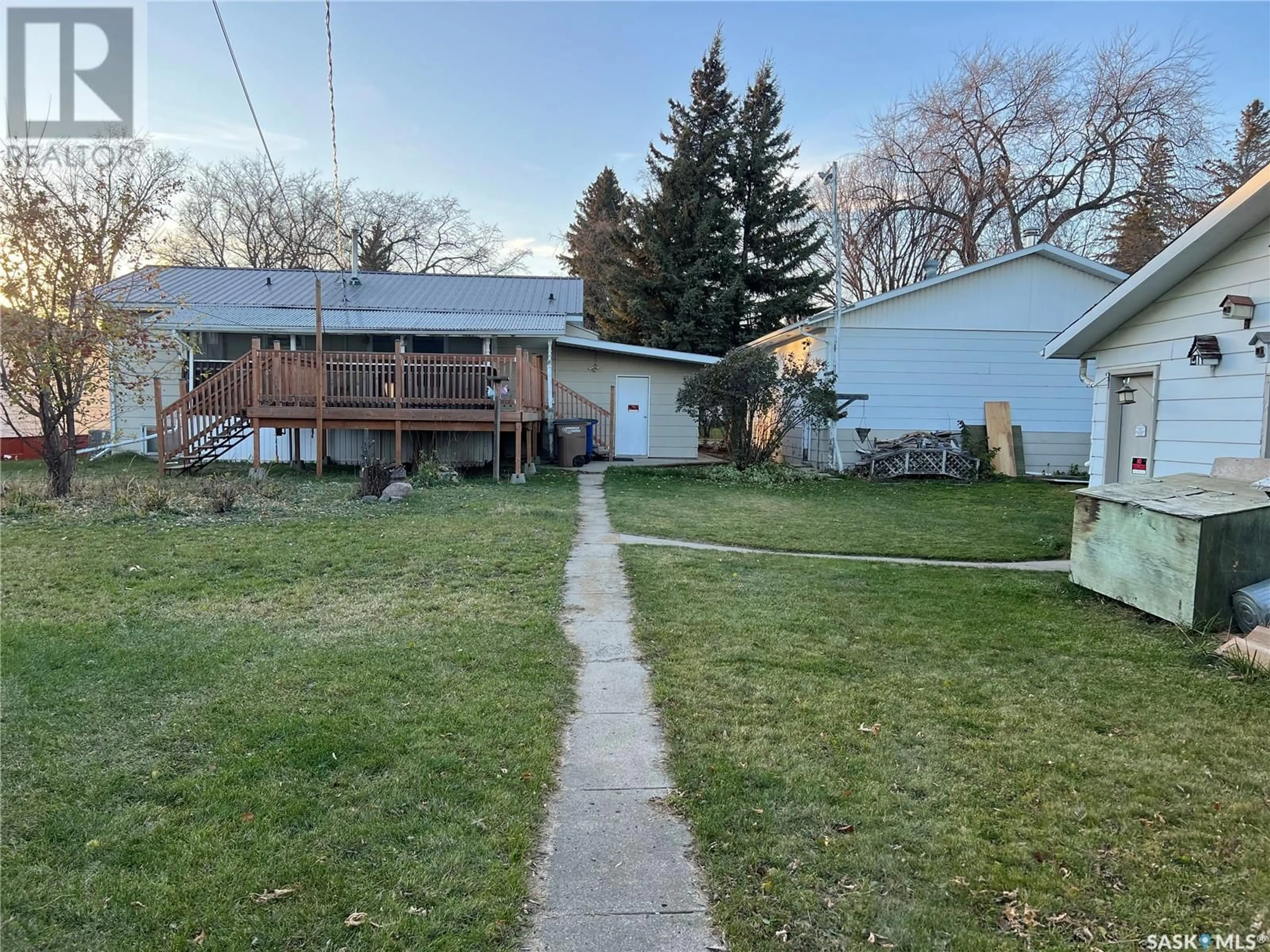 Frontside or backside of a home, the fenced backyard for 228 Katherine AVENUE N, Porcupine Plain Saskatchewan S0E1H0