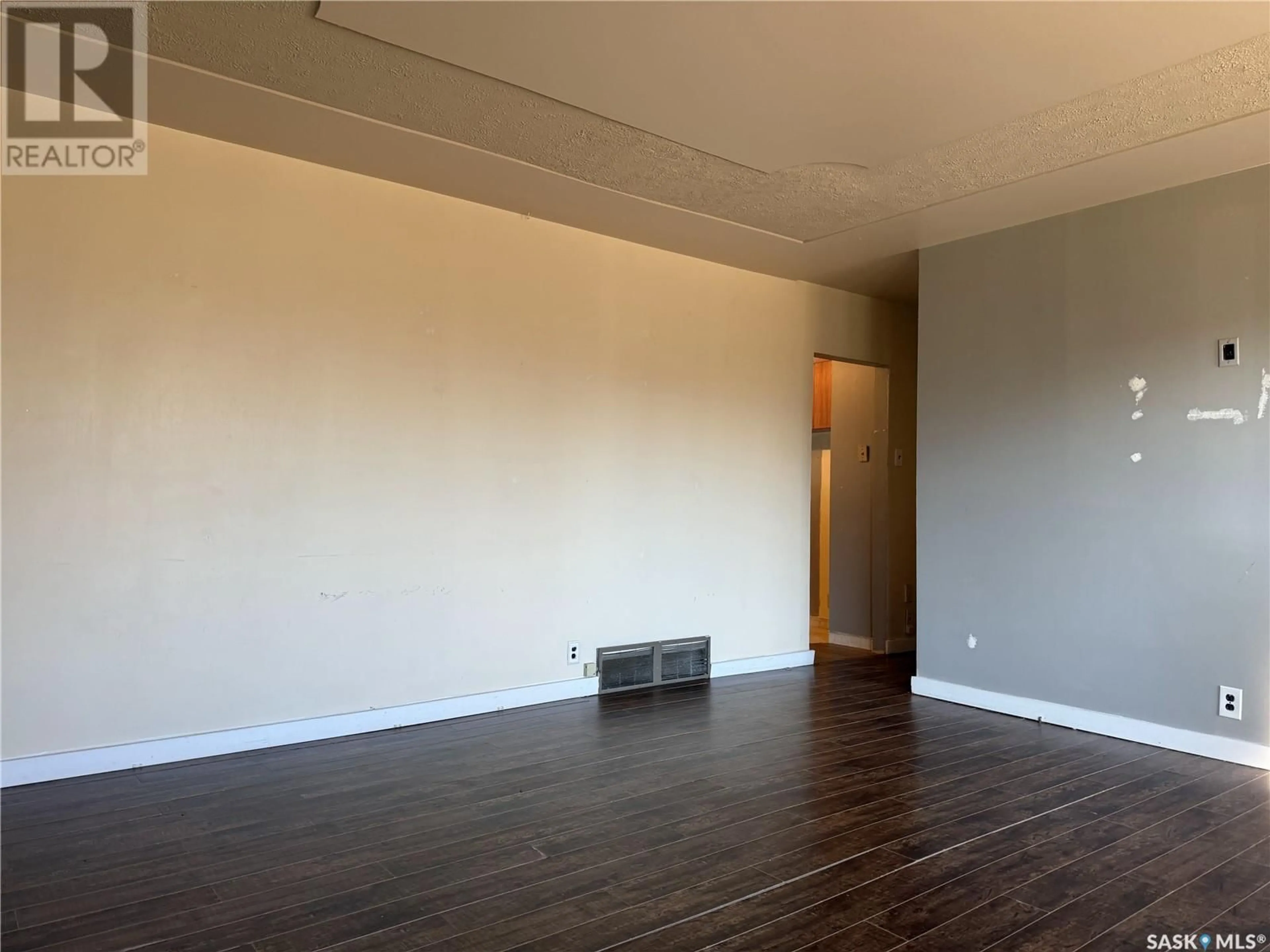 A pic of a room, wood floors for 1332 6th AVENUE NW, Moose Jaw Saskatchewan S6H4A8