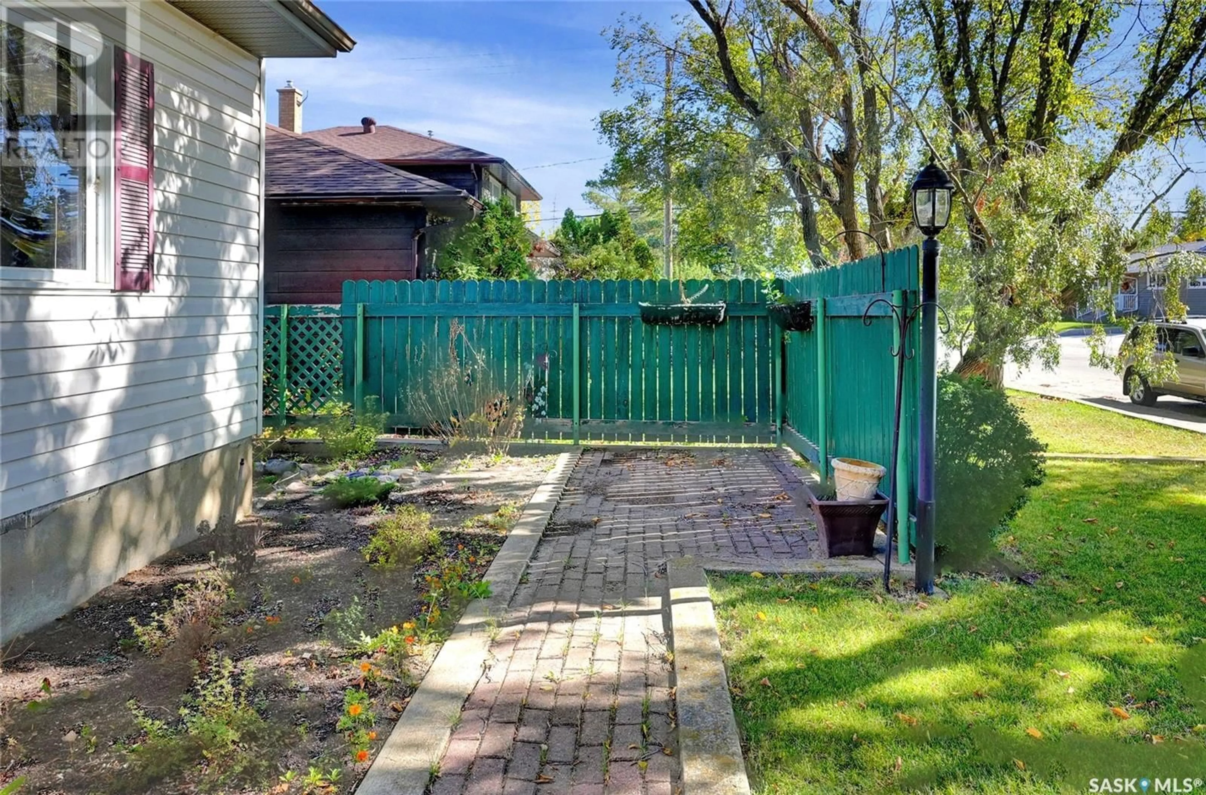 Patio, the fenced backyard for 918 Henry STREET, Moose Jaw Saskatchewan S6H3H2