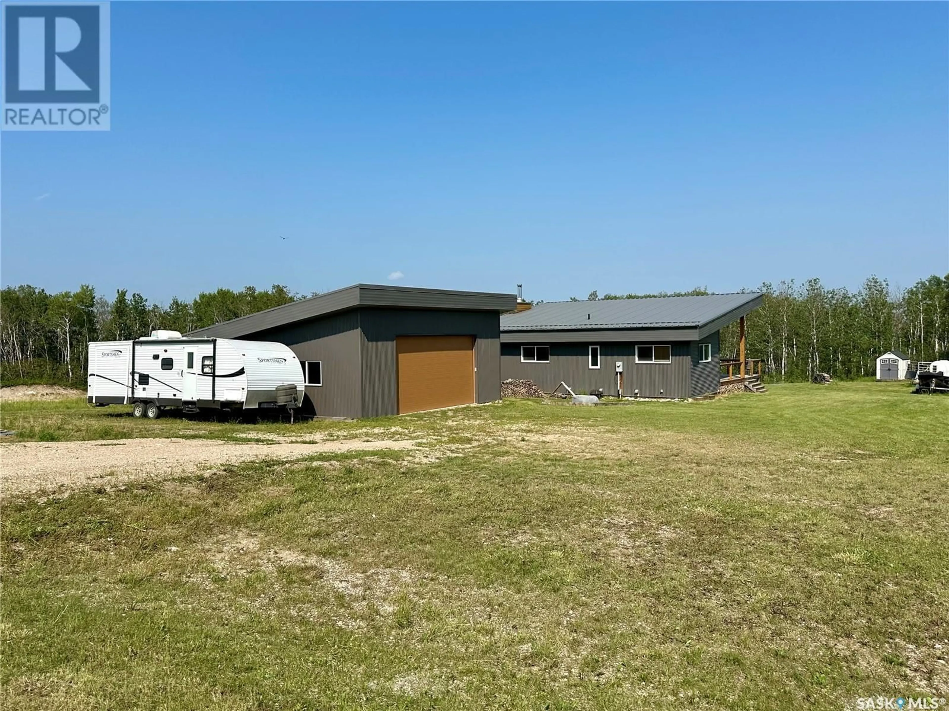 Frontside or backside of a home, the front or back of building for 117 Ravine ROAD, Big Shell Saskatchewan S0J2G0