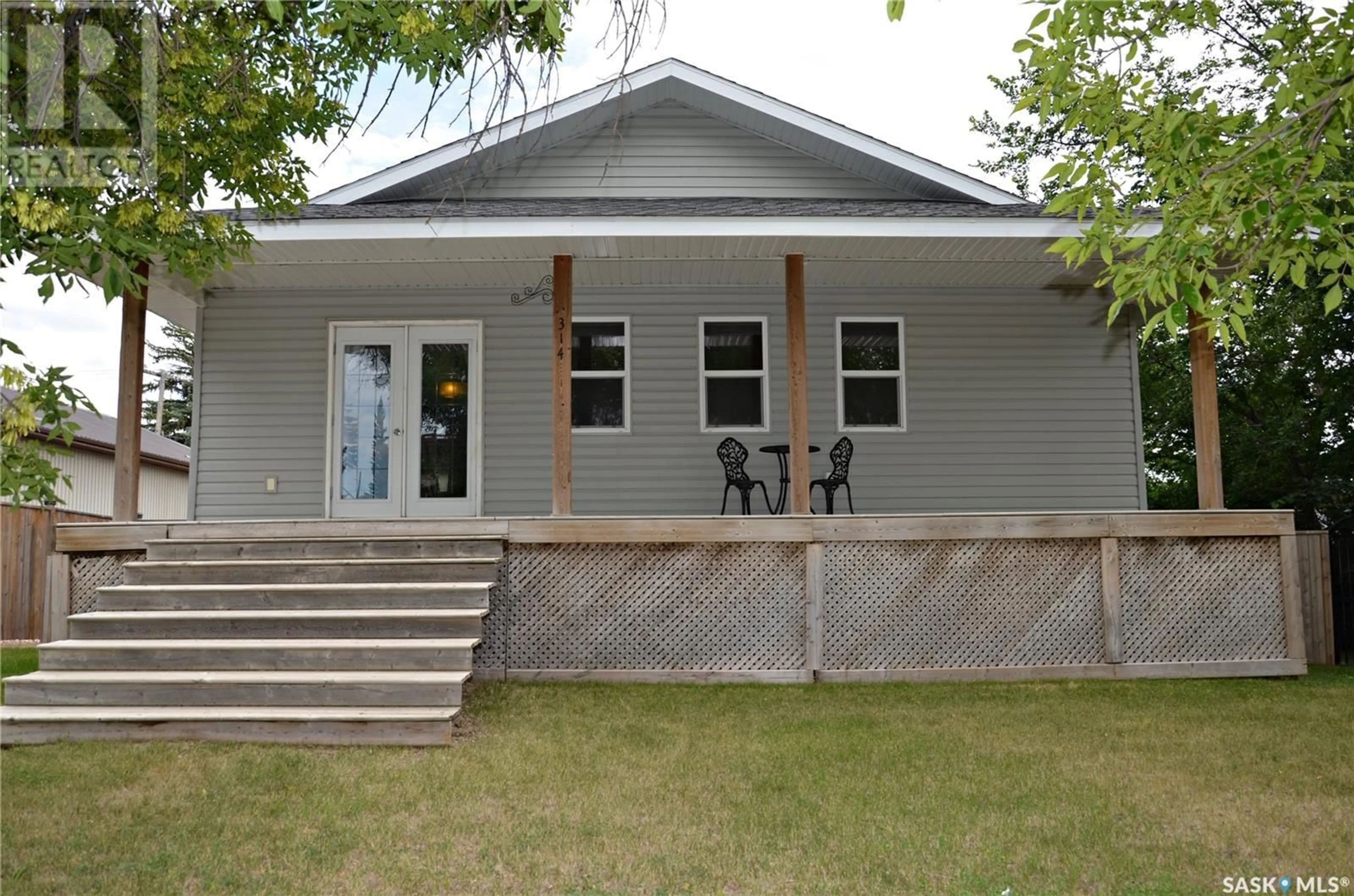 Frontside or backside of a home, the front or back of building for 314 Main STREET, Raymore Saskatchewan S0A3J0