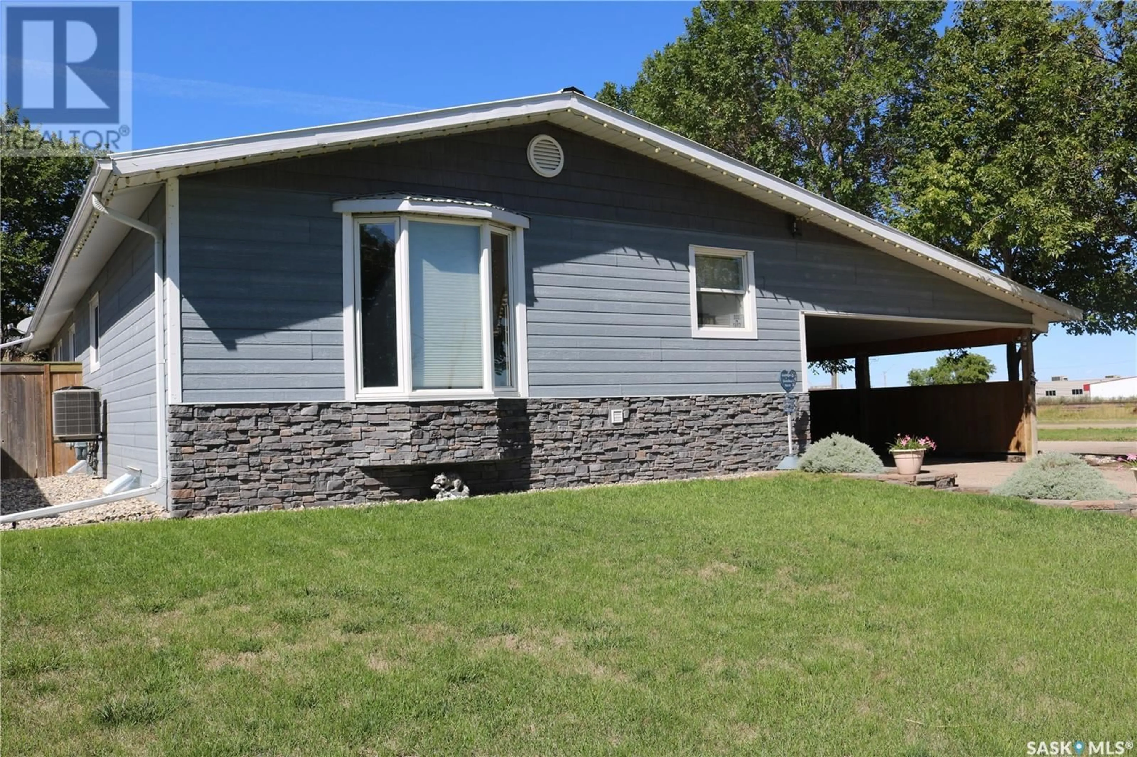 Home with vinyl exterior material for 602 Mountain STREET, Moosomin Saskatchewan S0G3N0