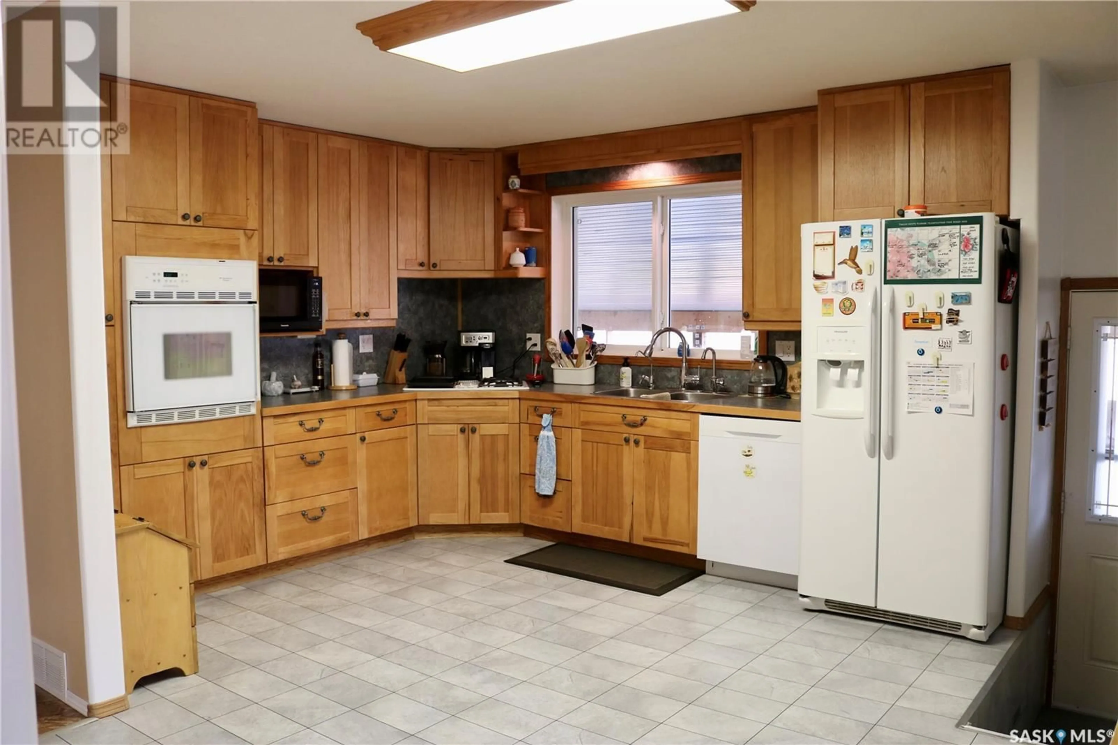 Kitchen, wood floors, cottage for 602 Mountain STREET, Moosomin Saskatchewan S0G3N0